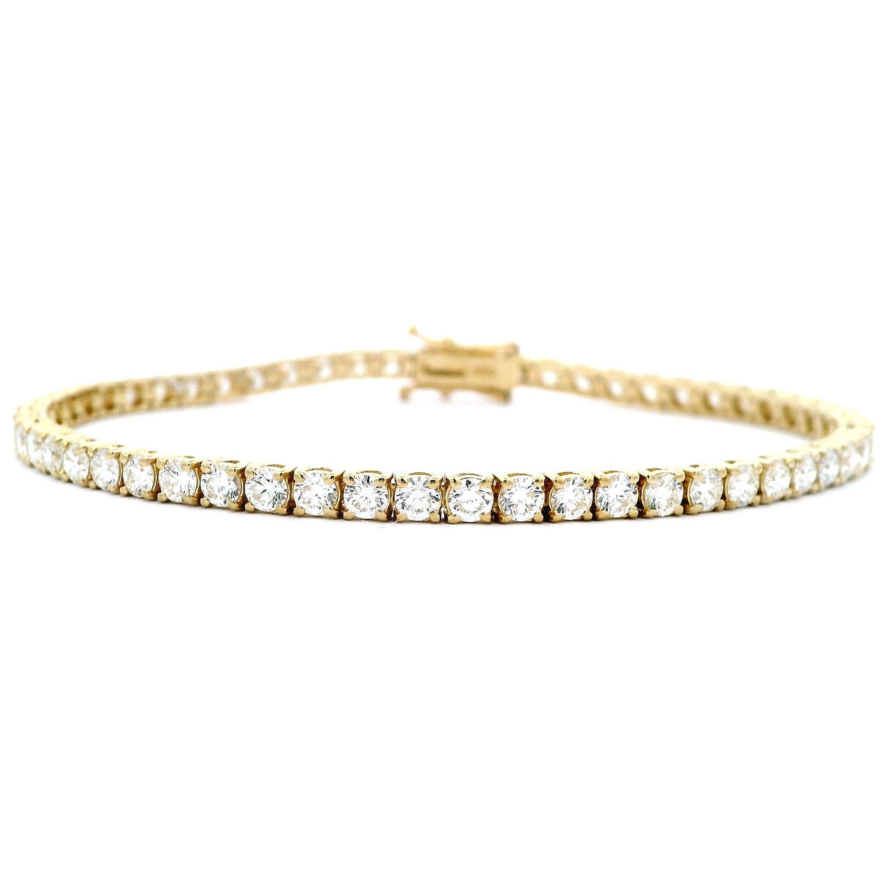 Beautiful and classic diamond tennis bracelet. Created by Alexander Beverly Hills.
57 round brilliant diamonds, 5.15 carats. Approximately H/I color and VS clarity. 18k yellow gold, 10.50 grams, 7in.
Accommodated with an up to date digital appraisal