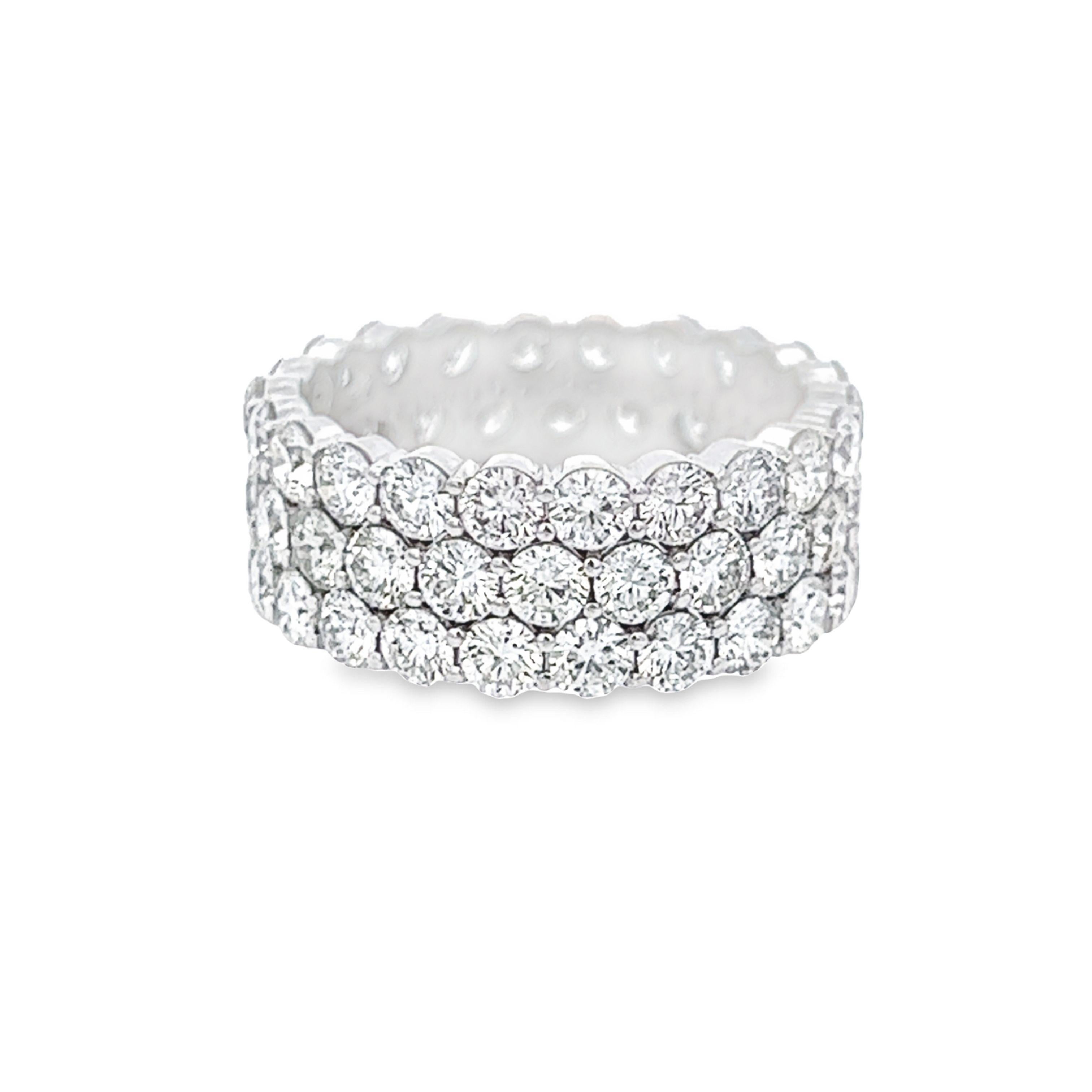 Stunning round diamond three-row eternity ring, by Alexander Beverly Hills.
66 round brilliant diamonds, 5.32 carats total. G/H color and VS clarity. Set in 18k white gold, 7.13 grams, size 6.5. 
Accommodated with an up-to-date digital appraisal by