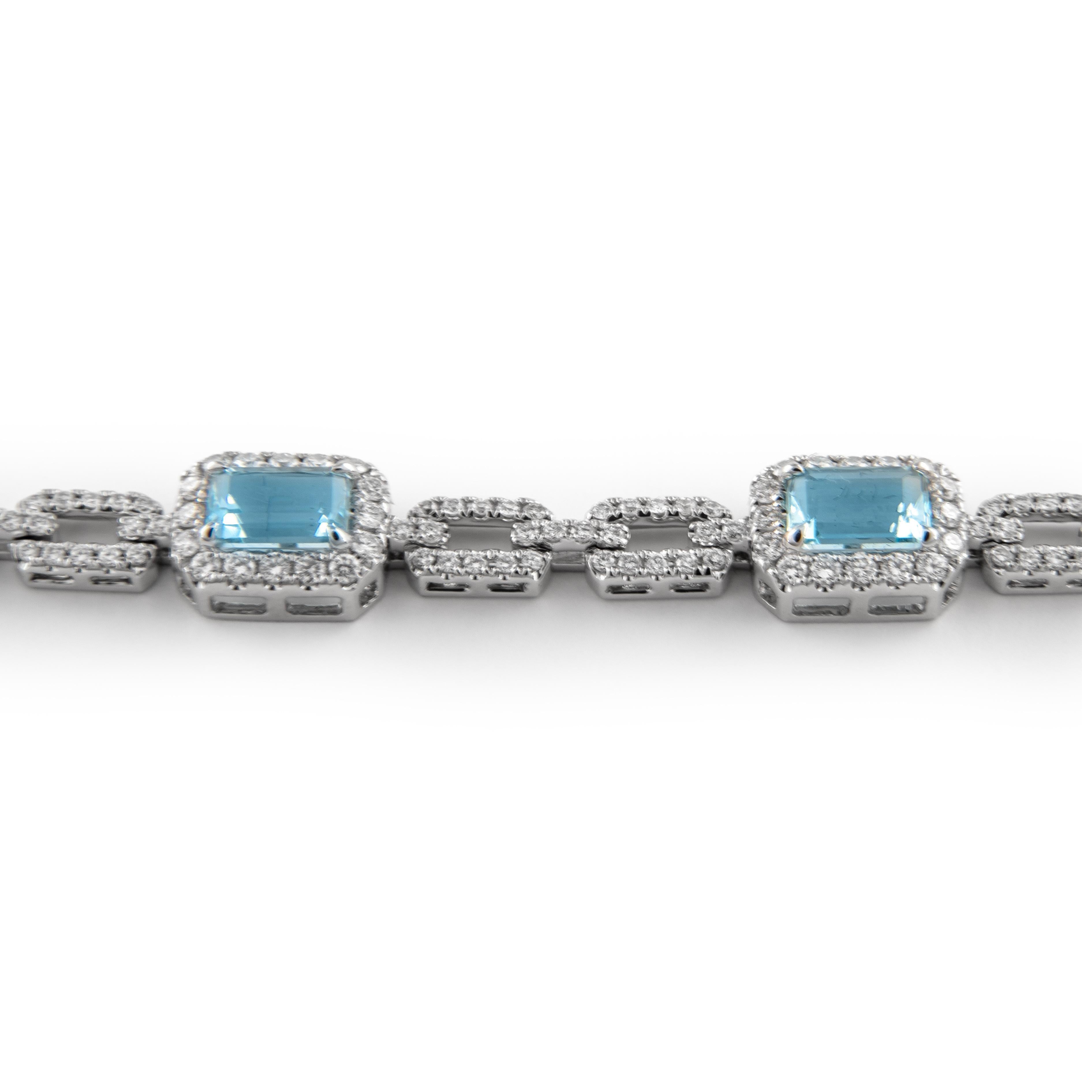 Exquisite modern aquamarine and diamond bracelet, by Alexander Beverly Hills.
5.71 carats total gemstone weight.
7 emerald cut aquamarines, 3.90 carats. Complimented by 301 round brilliant diamonds, 1.81 carats. Approximately E/F color and VVS2/VS1
