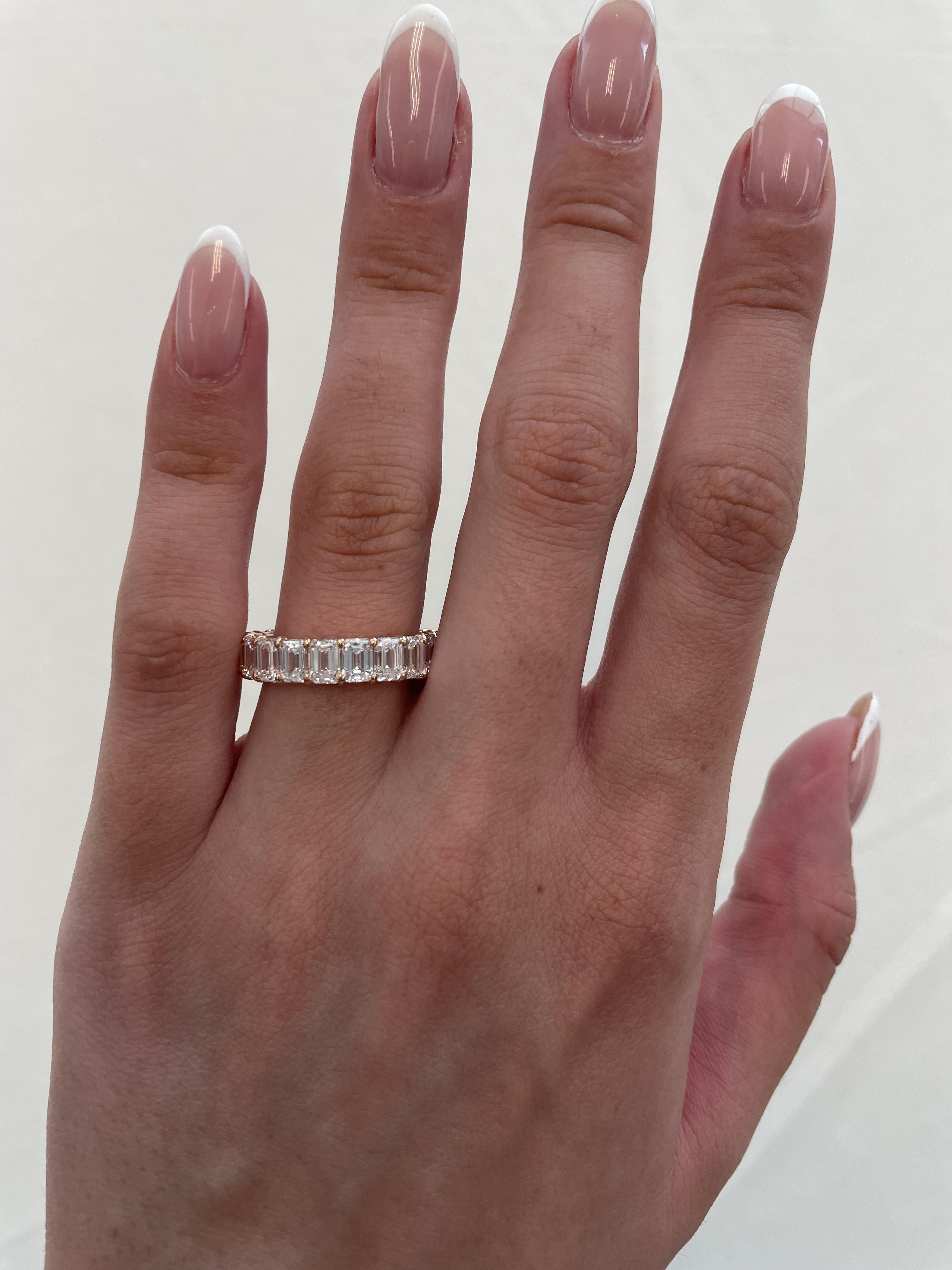 Stunning emerald cut diamond eternity band, by Alexander Beverly Hills.
20 emerald cut diamonds, 6.23 carats total. F/G color and VVS1/VVS2 clarity. Set in 18-karat rose gold, 3.91 grams, size 6.5.
Accommodated with an up-to-date digital appraisal