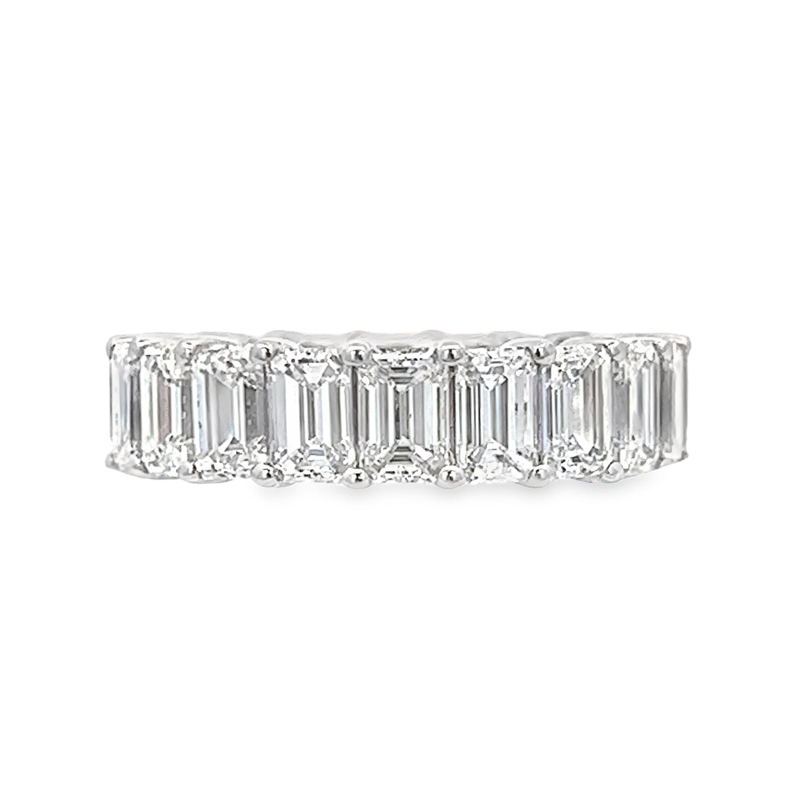 Stunning emerald cut diamond eternity band, by Alexander Beverly Hills.
20 emerald cut diamonds, 6.36 carats total. E/F color and VVS clarity. 4 prong set in 18k white gold, 5.35 grams, size 5.5. 
Accommodated with an up-to-date appraisal by a GIA