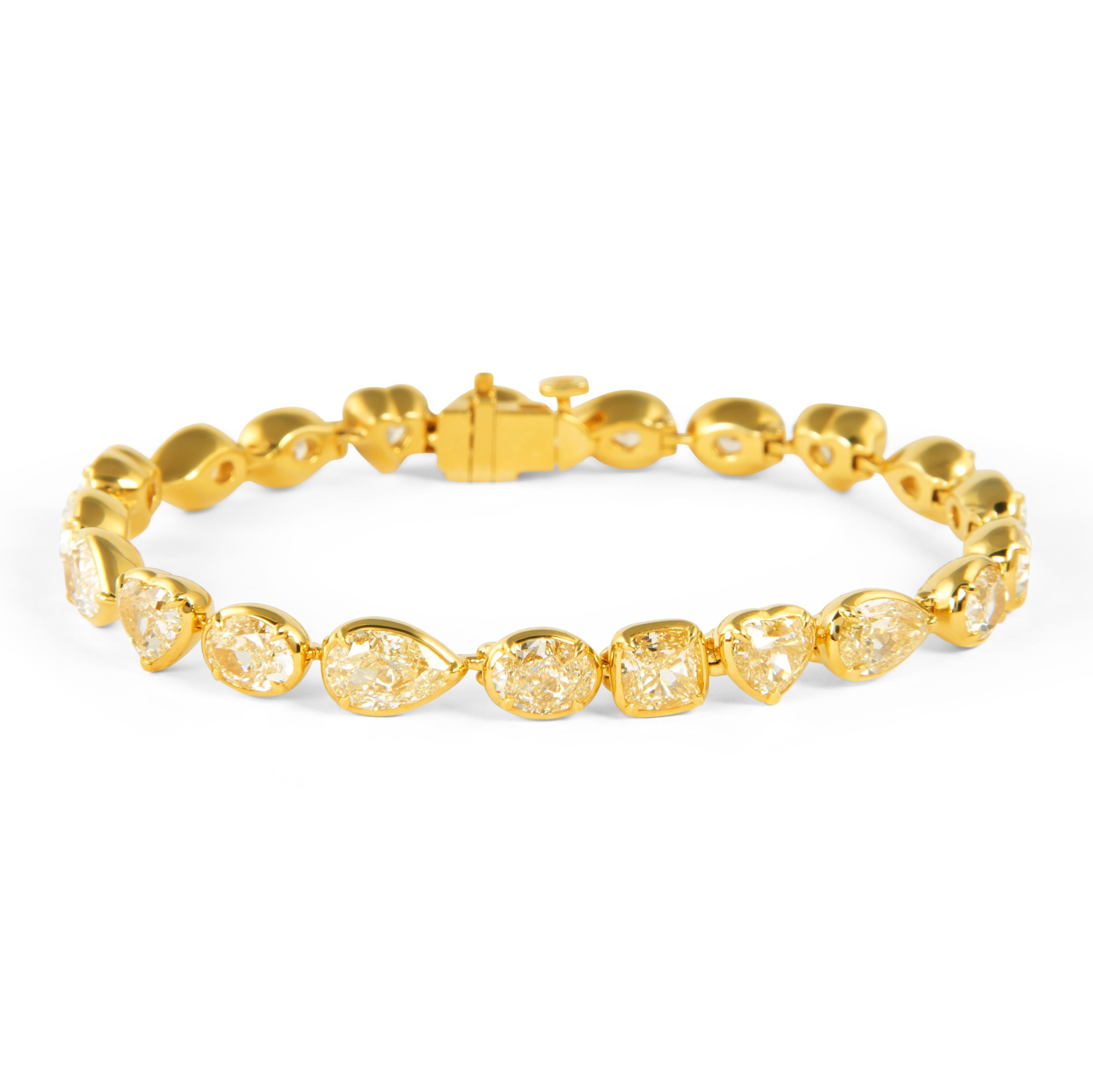 Sensational modern alternating multi natural yellow diamond bezel set tennis bracelet, EGL certified. High jewelry by Alexander Beverly Hills.
71.71 carats total natural diamond weight.
Necklace
48 oval, heart, radiant, pear, and cushion shape