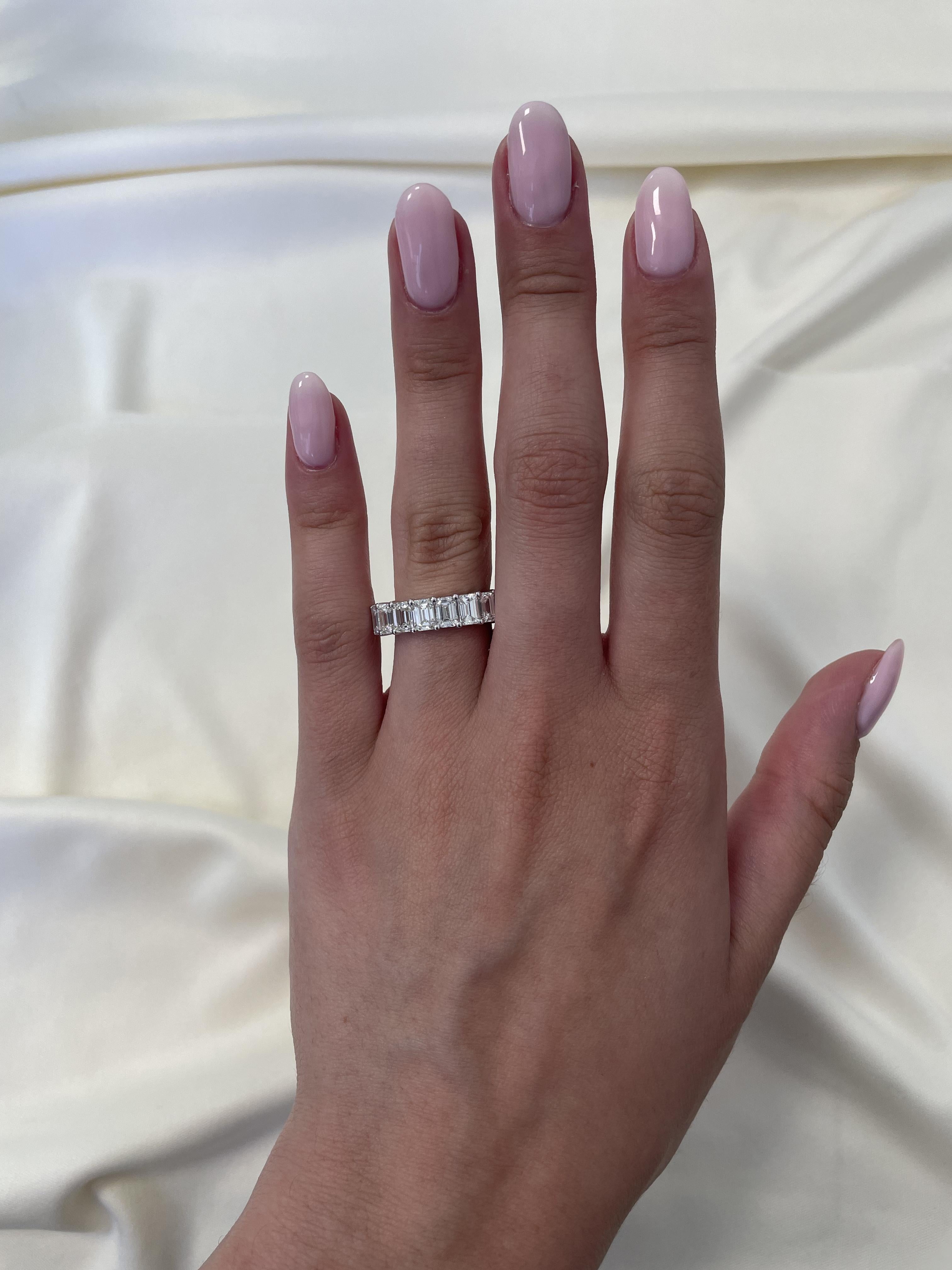 Stunning emerald cut diamond eternity band, by Alexander Beverly Hills.
19 emerald cut diamonds, 7.55 carats total. Approximately F color and VVS1 clarity. 4 prong set in 18k white gold, 6.16 grams, size 6.
Accommodated with an up-to-date appraisal