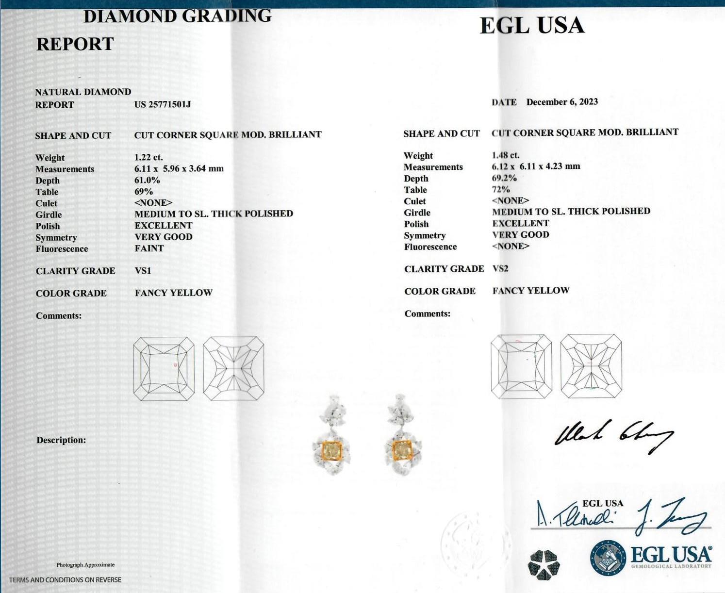 Stunning natural yellow diamonds with multi diamond cluster earrings, EGL certified, by Alexander Beverly Hills.
7.67 carats total diamond weight.
2 radiant cut diamonds, 2.70 carats. Both Fancy Yellow color, one stone VS1 clarity and the other VS2