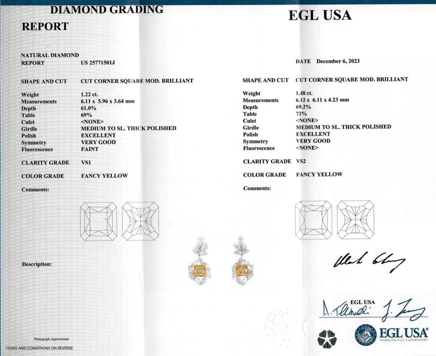 Stunning yellow diamonds with multi diamond cluster earrings, EGL certified, by Alexander Beverly Hills. 
7.67 carats total diamond weight. 
2 radiant cut diamonds, 2.70 carats. Both Fancy Yellow color, one stone VS1 clarity and the other VS2