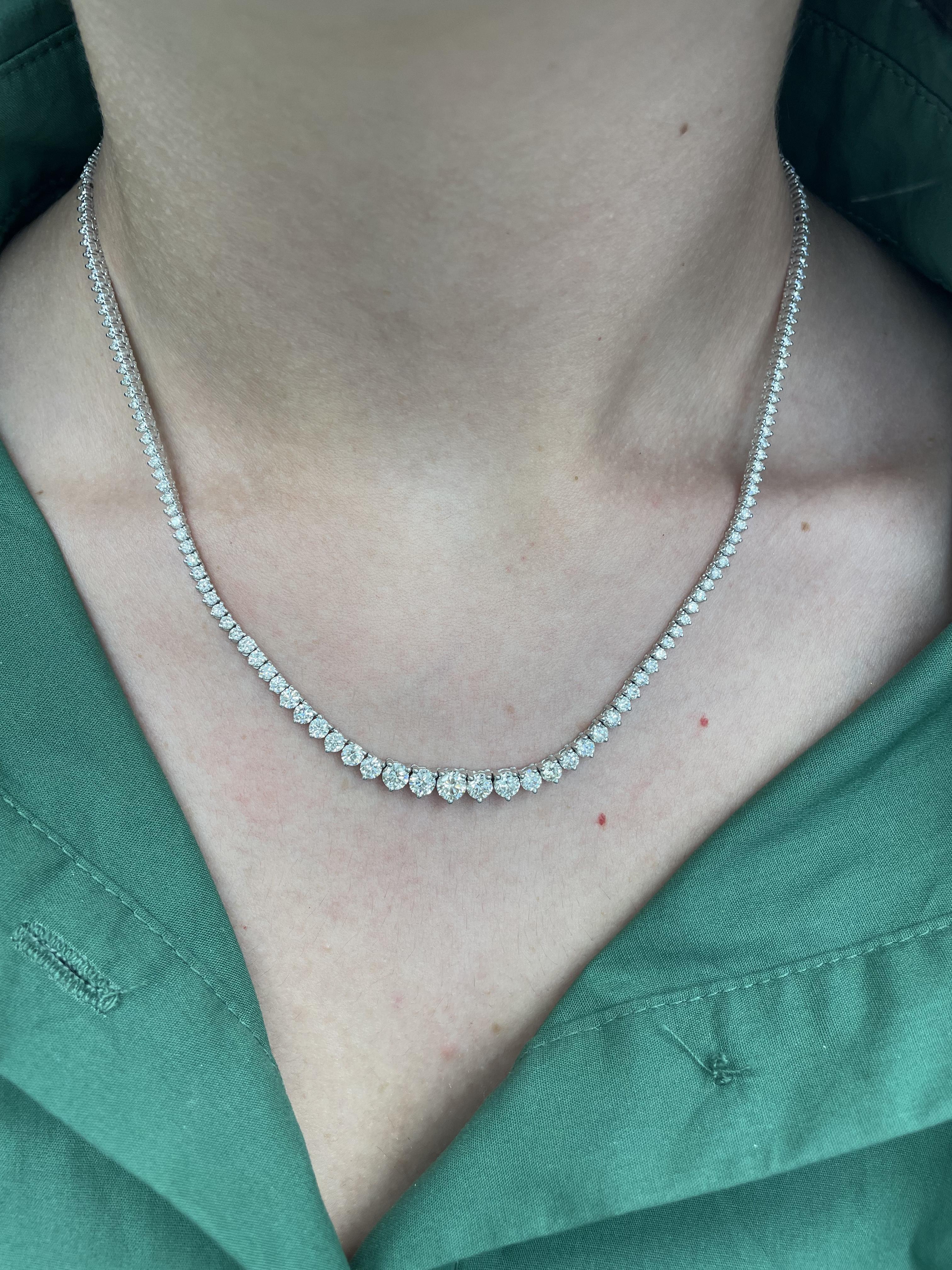 Beautiful and classic diamond 3-prong tennis riviera necklace, by Alexander Beverly Hills.
178 round brilliant diamonds, 7.70 carats. Approximately H-J color and VS1/VS2 clarity. 14-karat white gold, 19.02 grams, prong set, 17in.
Accommodated with