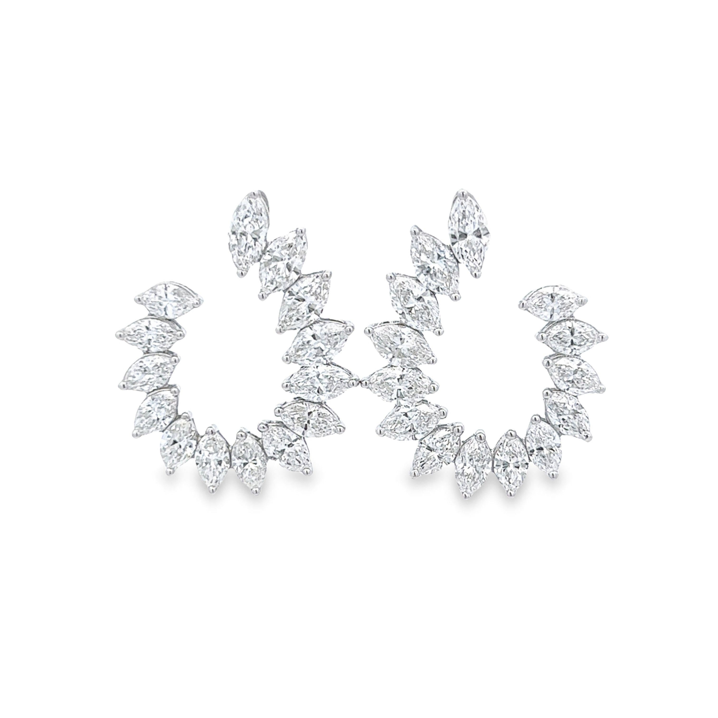 Stunning illusion set diamond cluster earrings diamonds, by Alexander Beverly Hills. 
28 marquise brilliant diamonds, 7.71 carats total. Approximately D-F color and VS clarity. 6.95 grams, 18-karat white gold.
Accommodated with an up-to-date digital