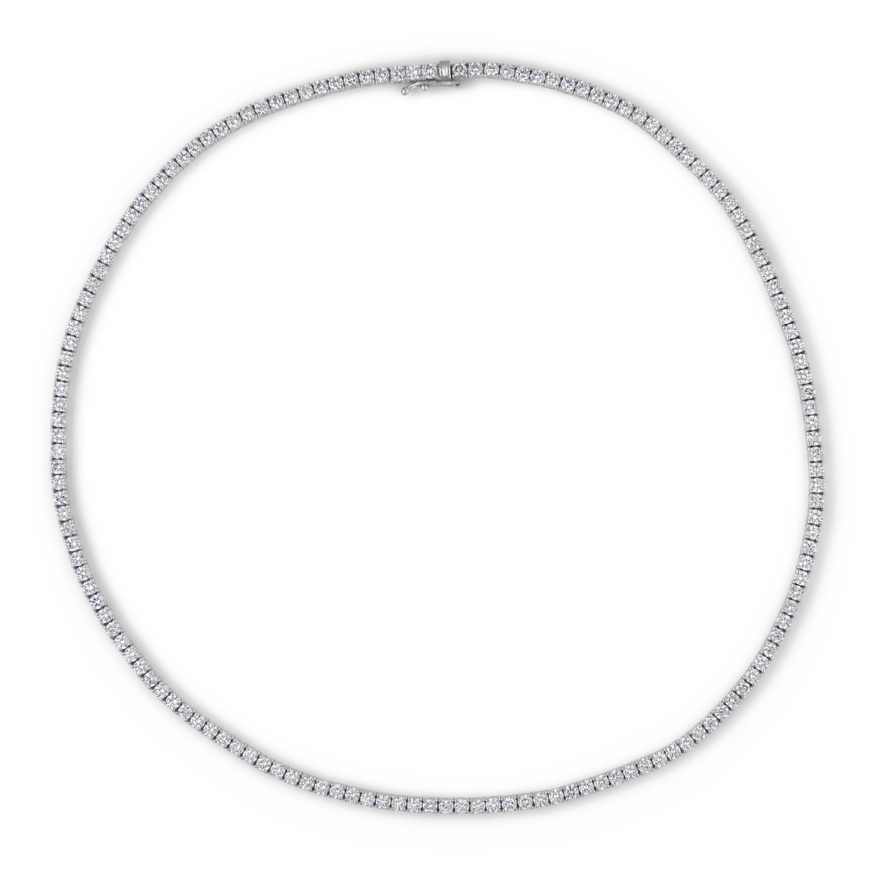 Beautiful and classic diamond tennis necklace. Created by Alexander Beverly Hills.
153 round brilliant diamonds, 9.09 carats. Approximately H/I color and VS2/SI1 clarity. 18k white gold, 18.78 grams, 16.5 inches.
Accommodated with an up-to-date
