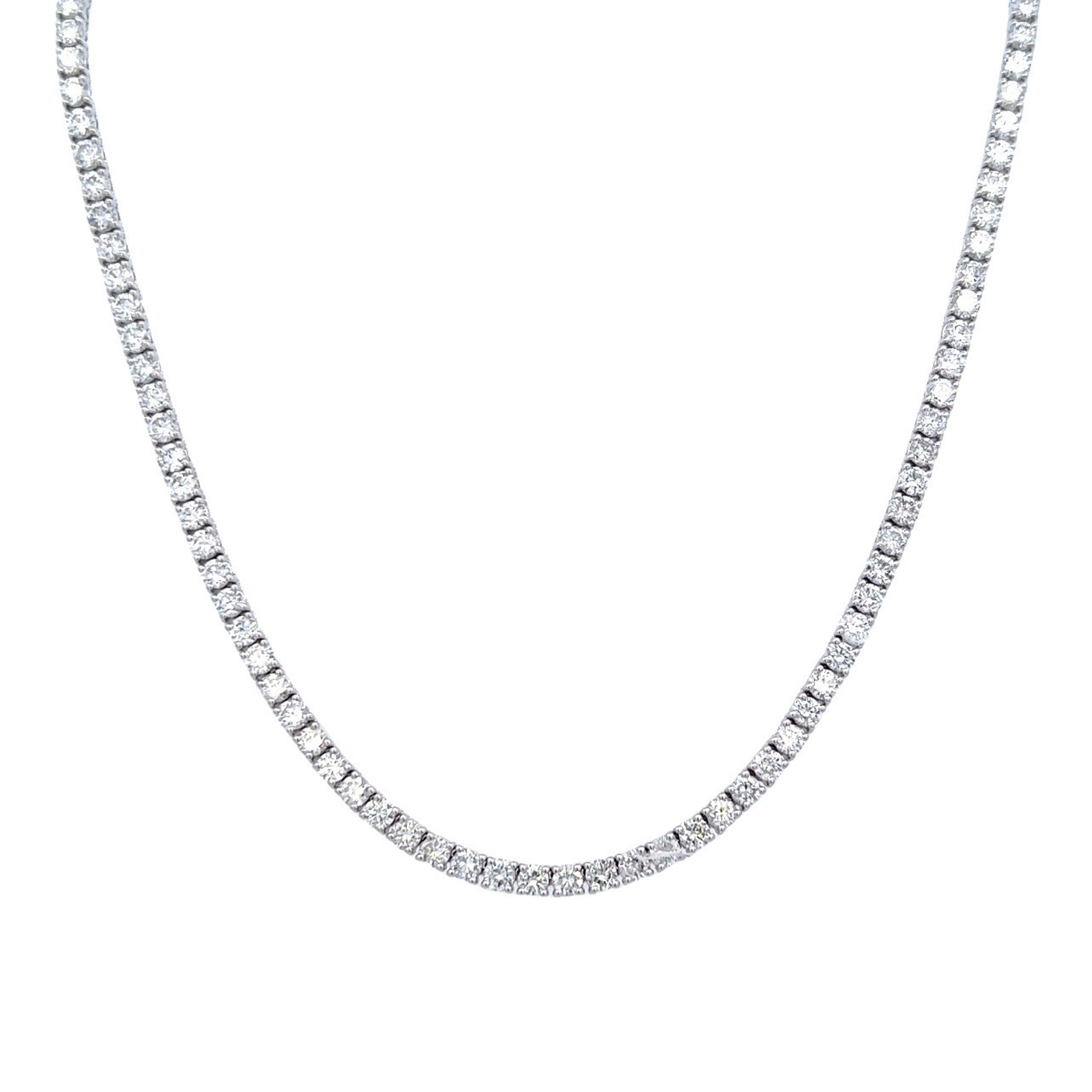 Beautiful and classic diamond tennis riviera necklace, by Alexander Beverly Hills.
150 round brilliant diamonds, 9.10 carats. Approximately E/F color and VS clarity. 18k white gold, 16.37 grams, 16in.
Accommodated with an up-to-date digital