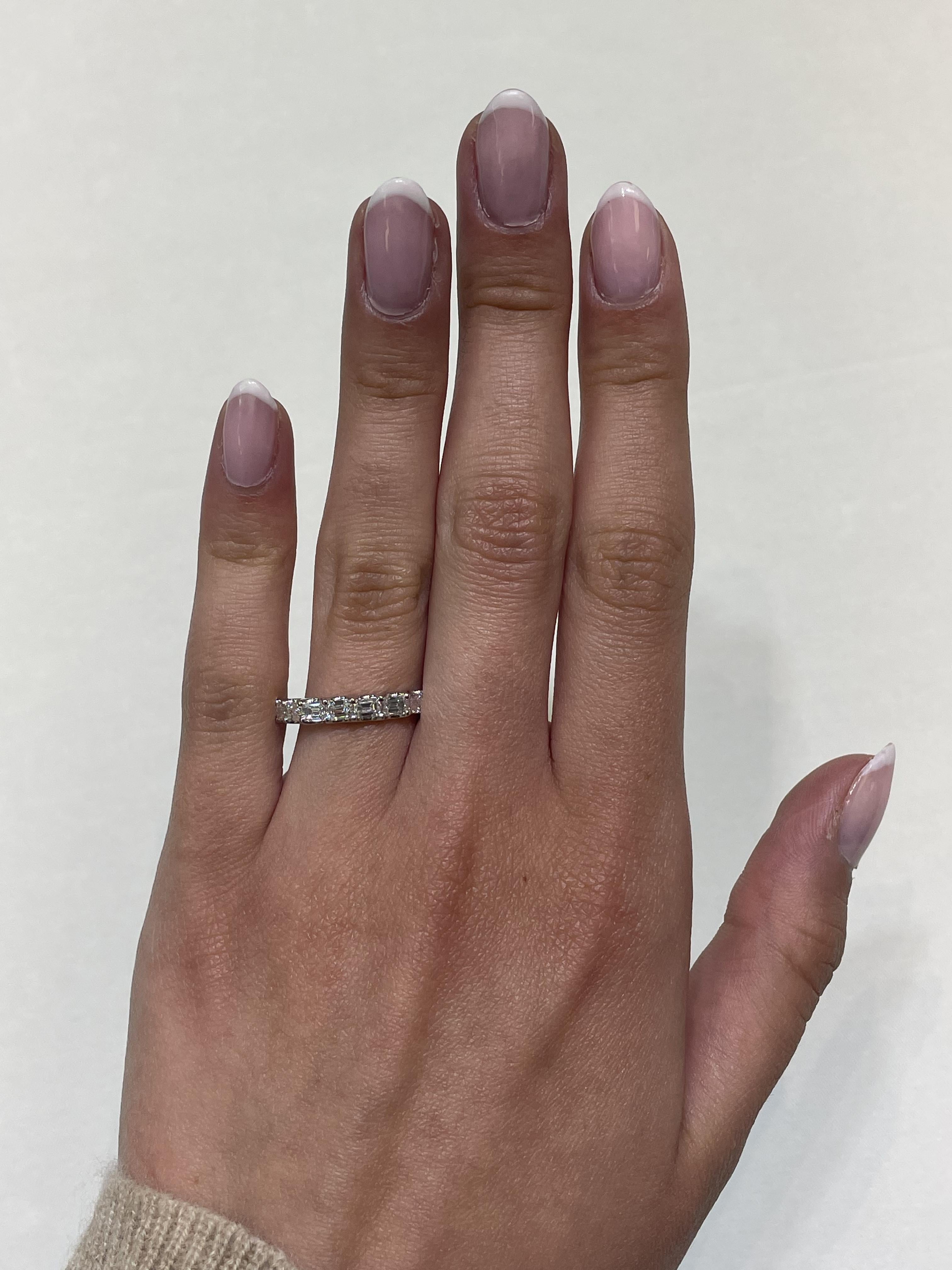 Stunning emerald cut diamond eternity band, by Alexander Beverly Hills.
7 emerald cut diamonds, 0.92 carats total. D-F color and VVS2 clarity. Set in 18-karat white gold, 2.50 grams, size 6.5.
Accommodated with an up to date digital appraisal by a