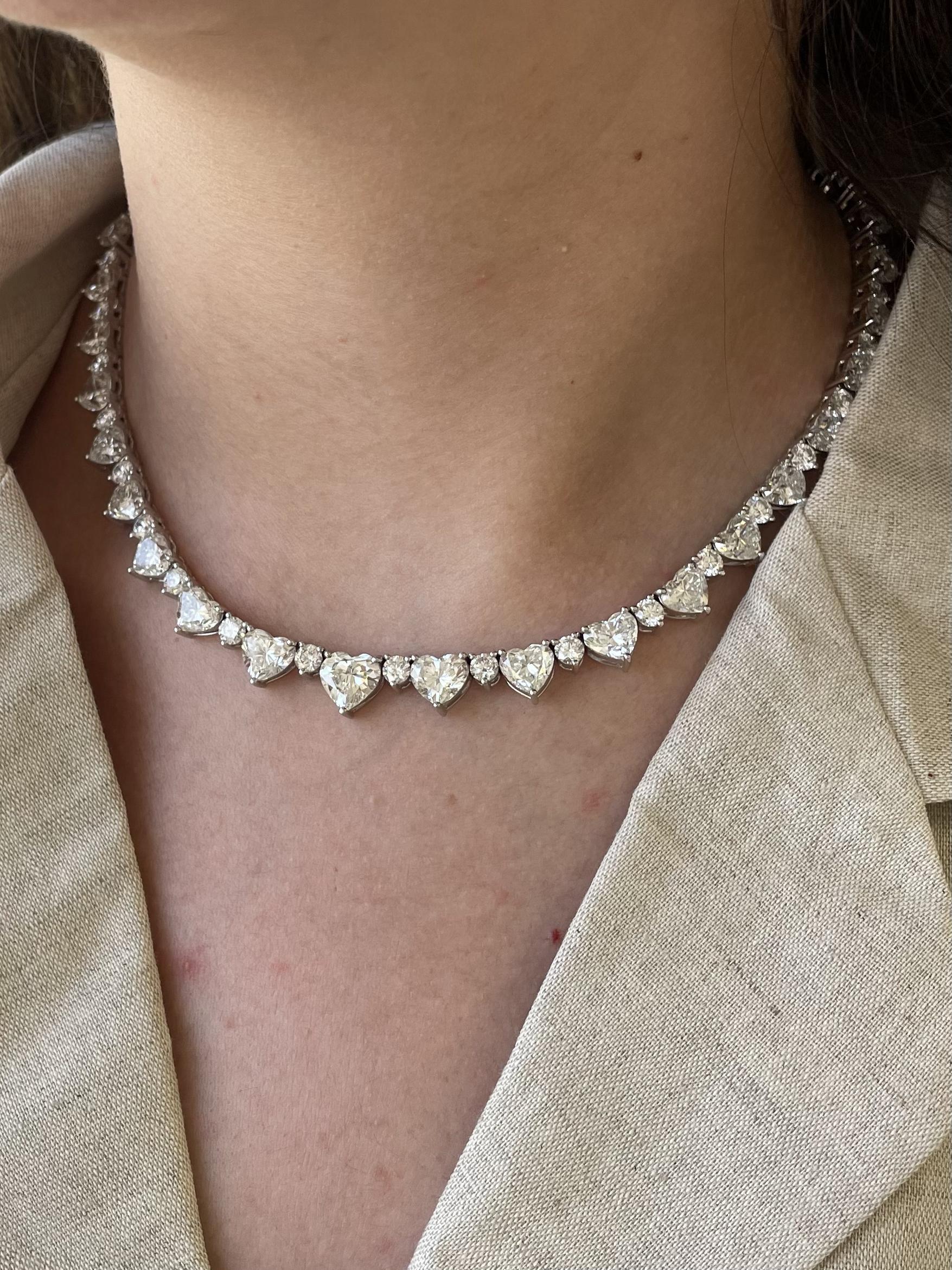 Sensational alternating heart diamond and round diamond tennis necklace, each stone GIA certified. High jewelry by Alexander Beverly Hills.
50.66 carats total diamond weight.
Center diamond 2.40 carats.
35 heart brilliant diamonds, 39.56 carats.