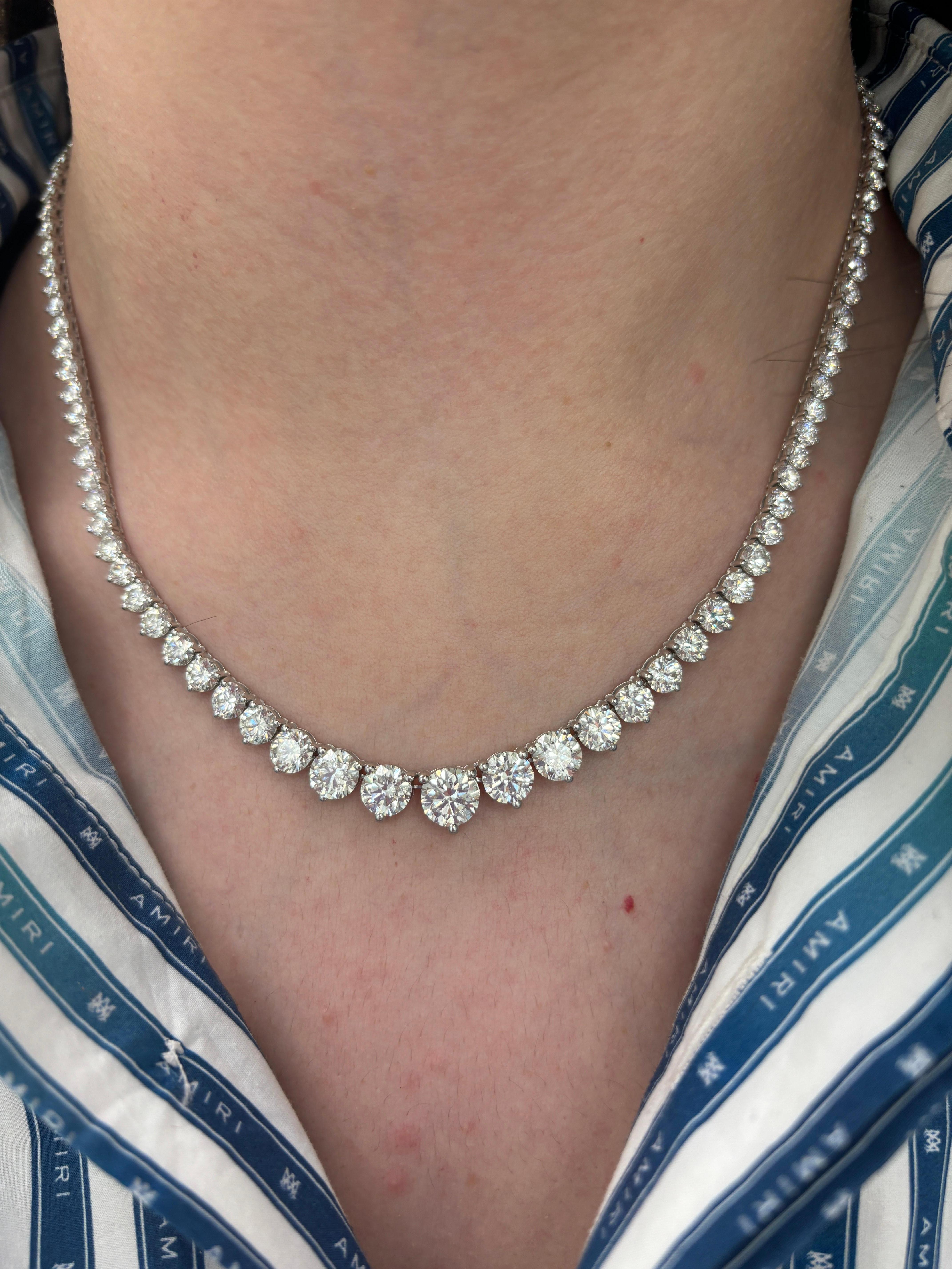Beautiful and classic diamond tennis riviera necklace, GIA certified, by Alexander Beverly Hills.
114 round brilliant diamonds, 22.26 carats, 15 stones GIA certified. Approximately G-I color and VVS2-VS2 clarity. 18k white gold, 21.99 grams,