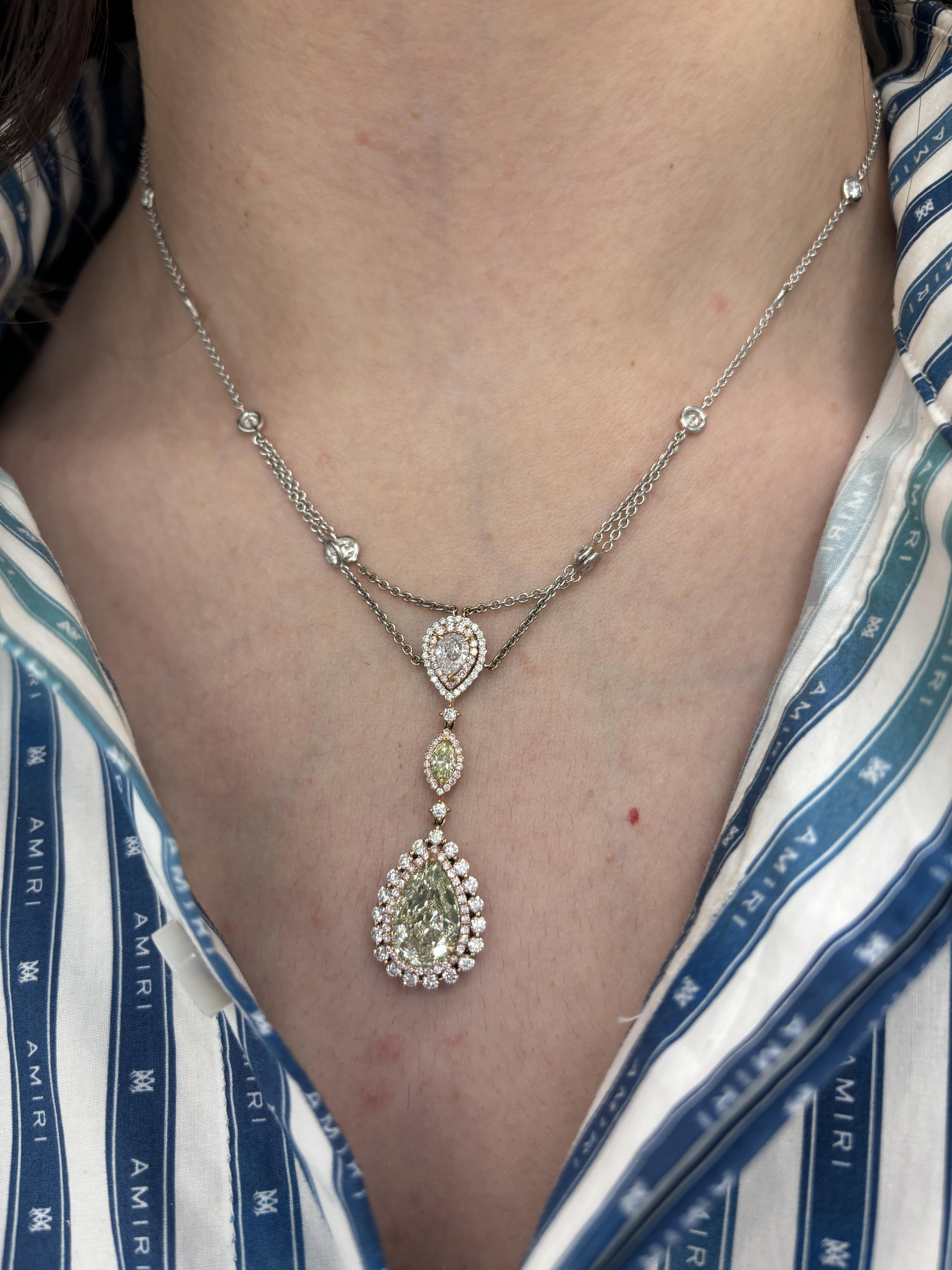 Stunning green yellow diamond necklace with three GIA certificate. High jewelry by Alexander Beverly Hills.
*Both green-yellow diamonds set with enamel backing to help compliment the stones color with the look of fancy yellow green.
5.97 carats
