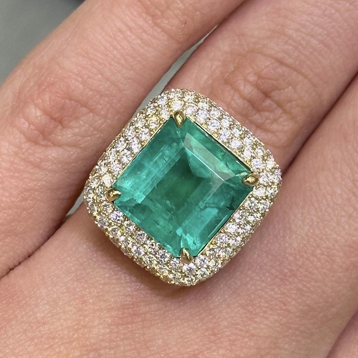 Stunning emerald of superb electric color with diamond pave halo ring, GIA certified, by Alexander Beverly Hills. 
9.74 carats total gemstone weight.
7.98 carat square emerald cut Brazilian emerald, GIA certified. 113 round brilliant diamonds, 1.76