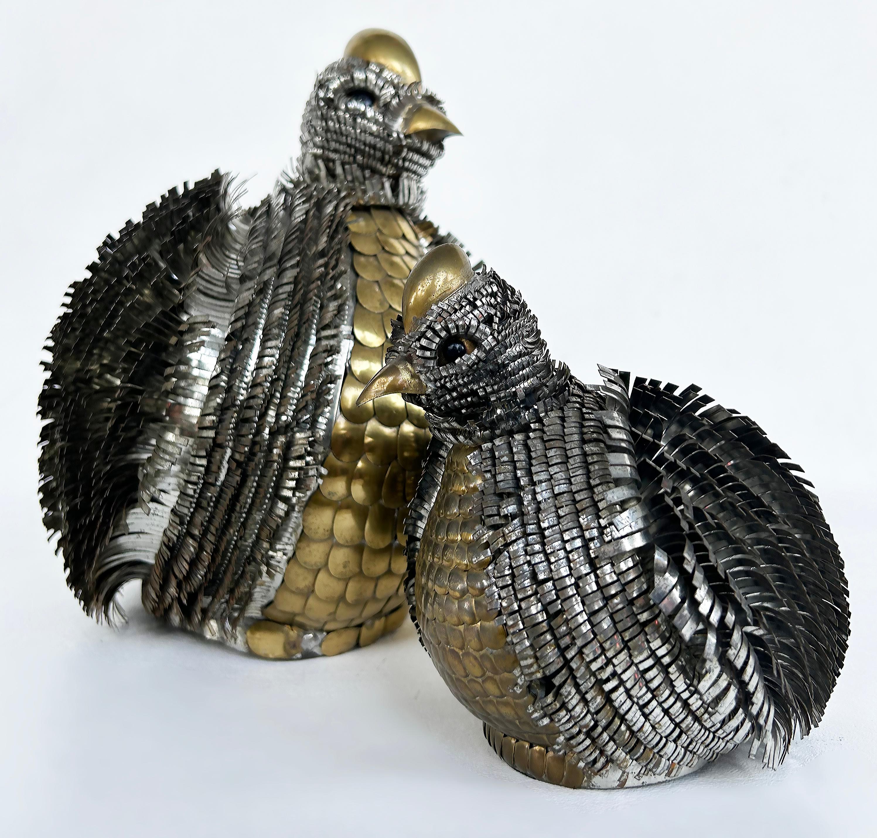 Mid-century Alexander Blazquez Bustamante Style Bird Figures in Mixed Metals 

Offered for sale is a pair of Mexican mixed metal figures of birds by Alexander Blazquez in the style of Sergio Bustamante.  These very intricate sculptures are sold as a