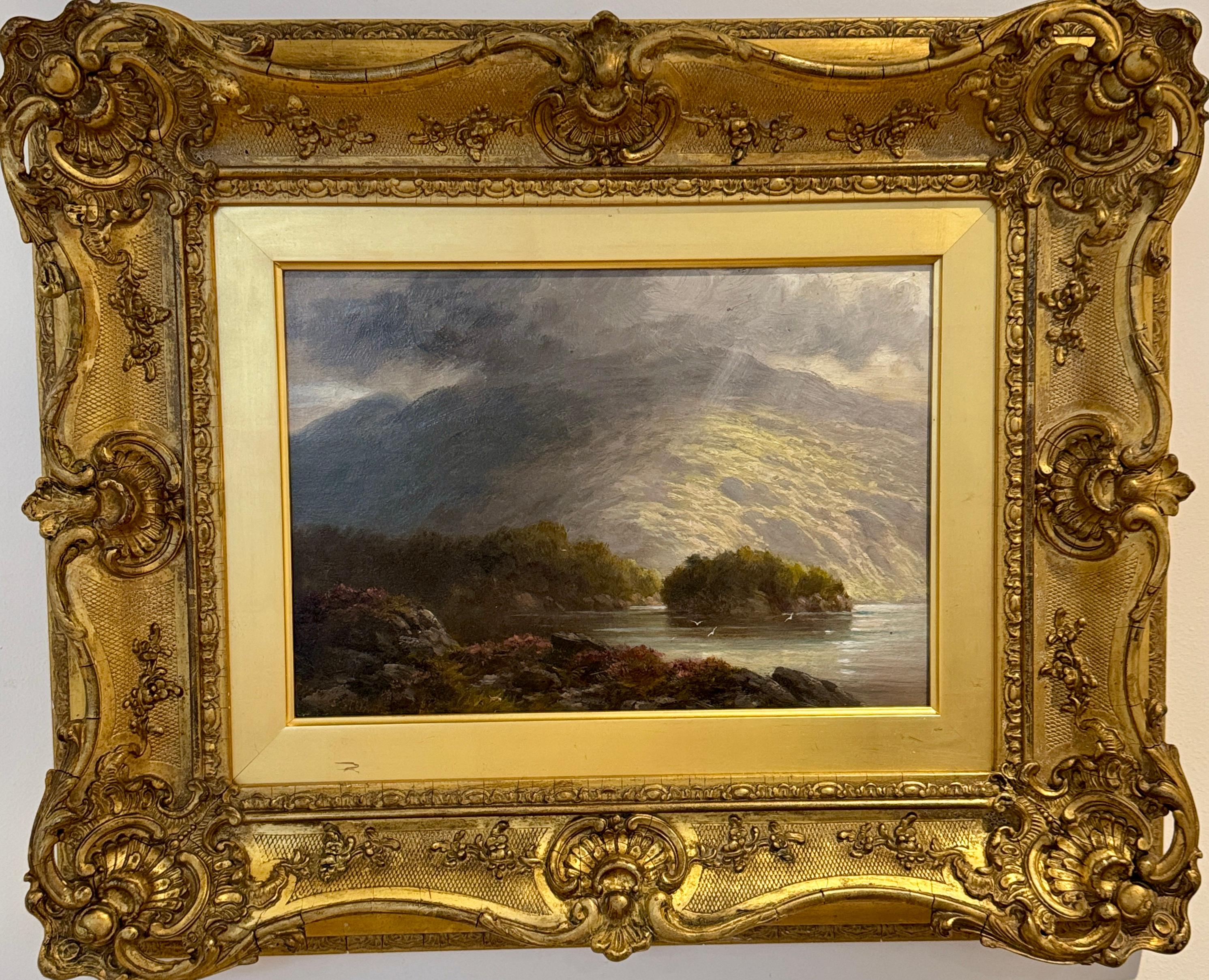 19th century Scottish Highland Loch landscape, with Sunlight shinning