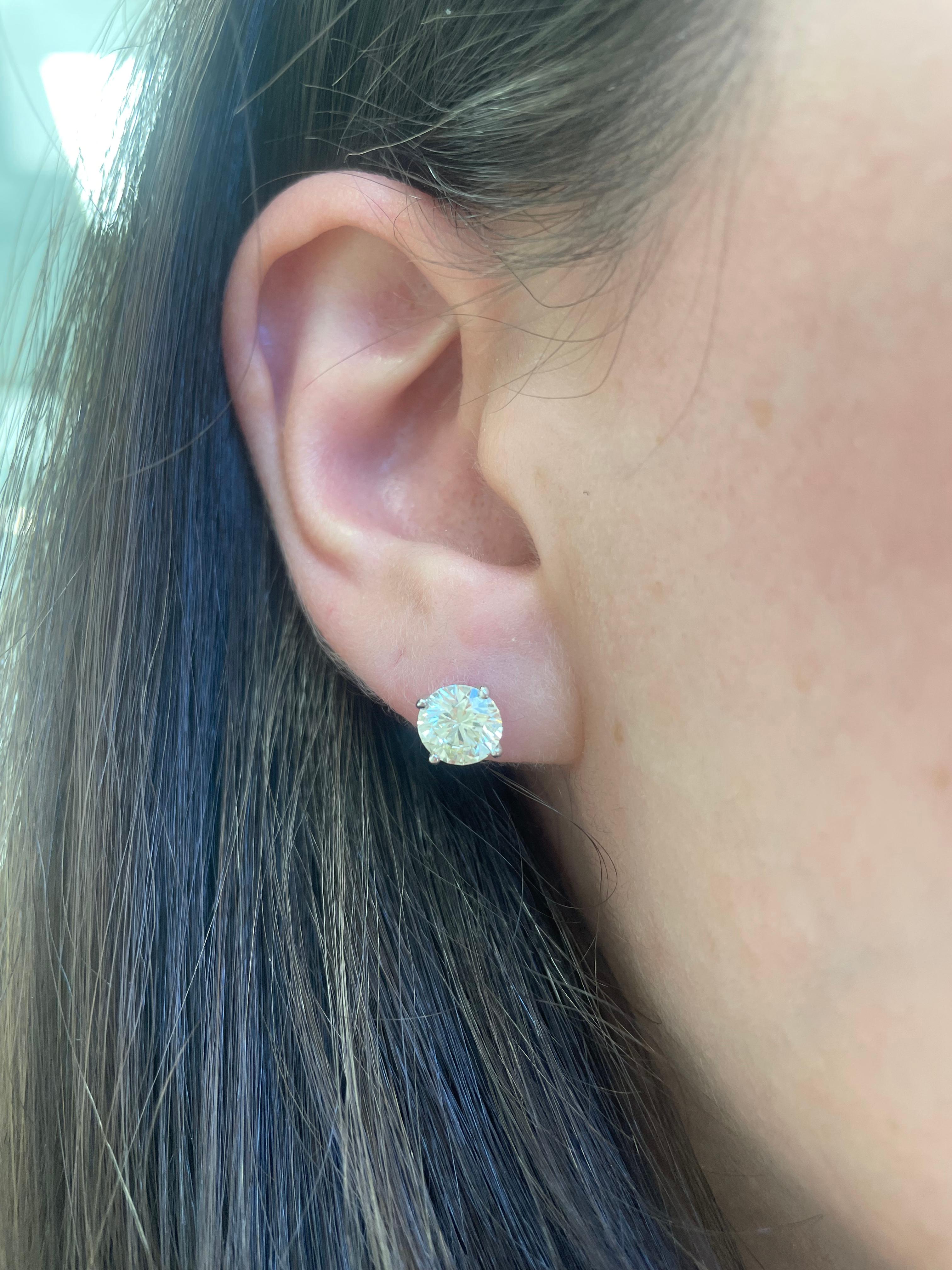 Classic diamond stud earrings, each stone EGL certified, by Alexander Beverly Hills.
Two matching round brilliant diamonds 1.44 carats total. Both stones L color grad and VVS2 clarity grade. 14k white gold.
Accommodated with an up to date appraisal