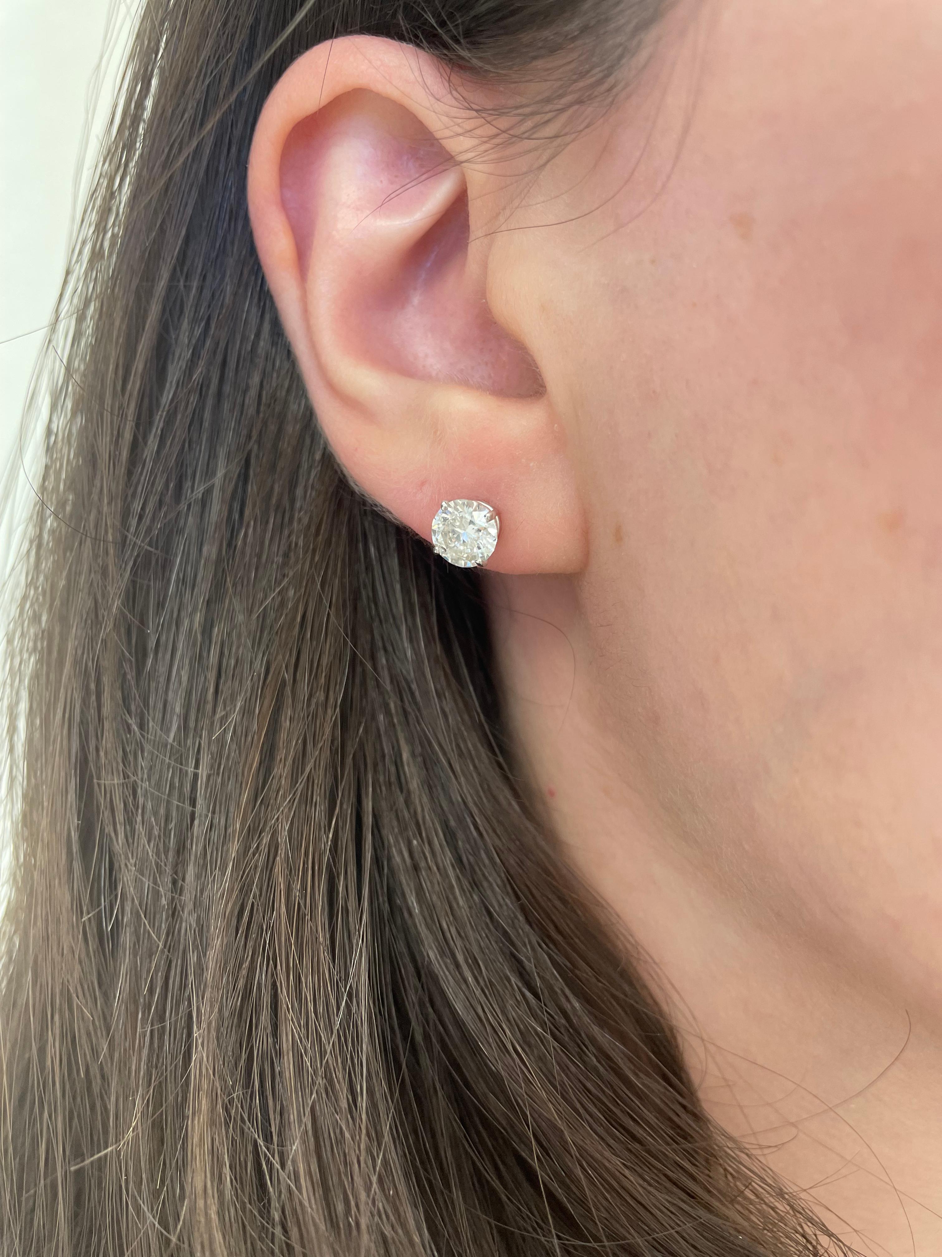 Classic diamond stud earrings, each stone EGL certified, by Alexander Beverly Hills.
Two matching round brilliant diamonds 2.02 carats total. Both stones G color grad and SI3 clarity grade. 14k white gold, 1.46 grams.
Accommodated with an up to date