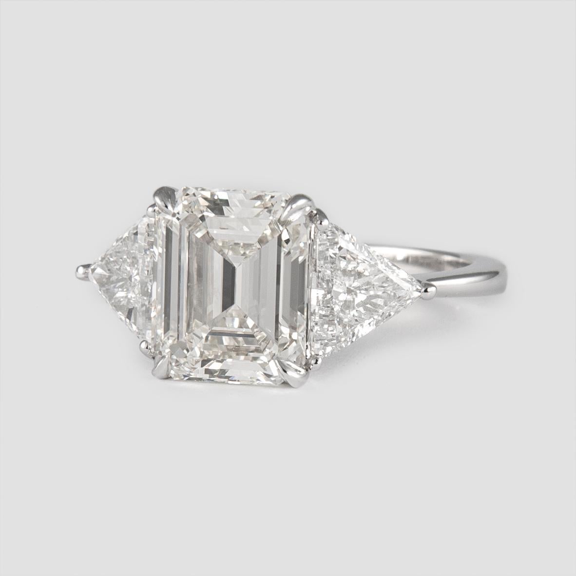 emerald cut with triangle side stones