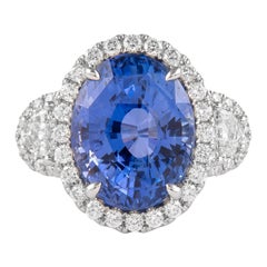 Anillo Halo de Tres Piedras con Zafiro de Ceilán Sin Calor y Diamantes Alexander GIA de 12,05 ct
