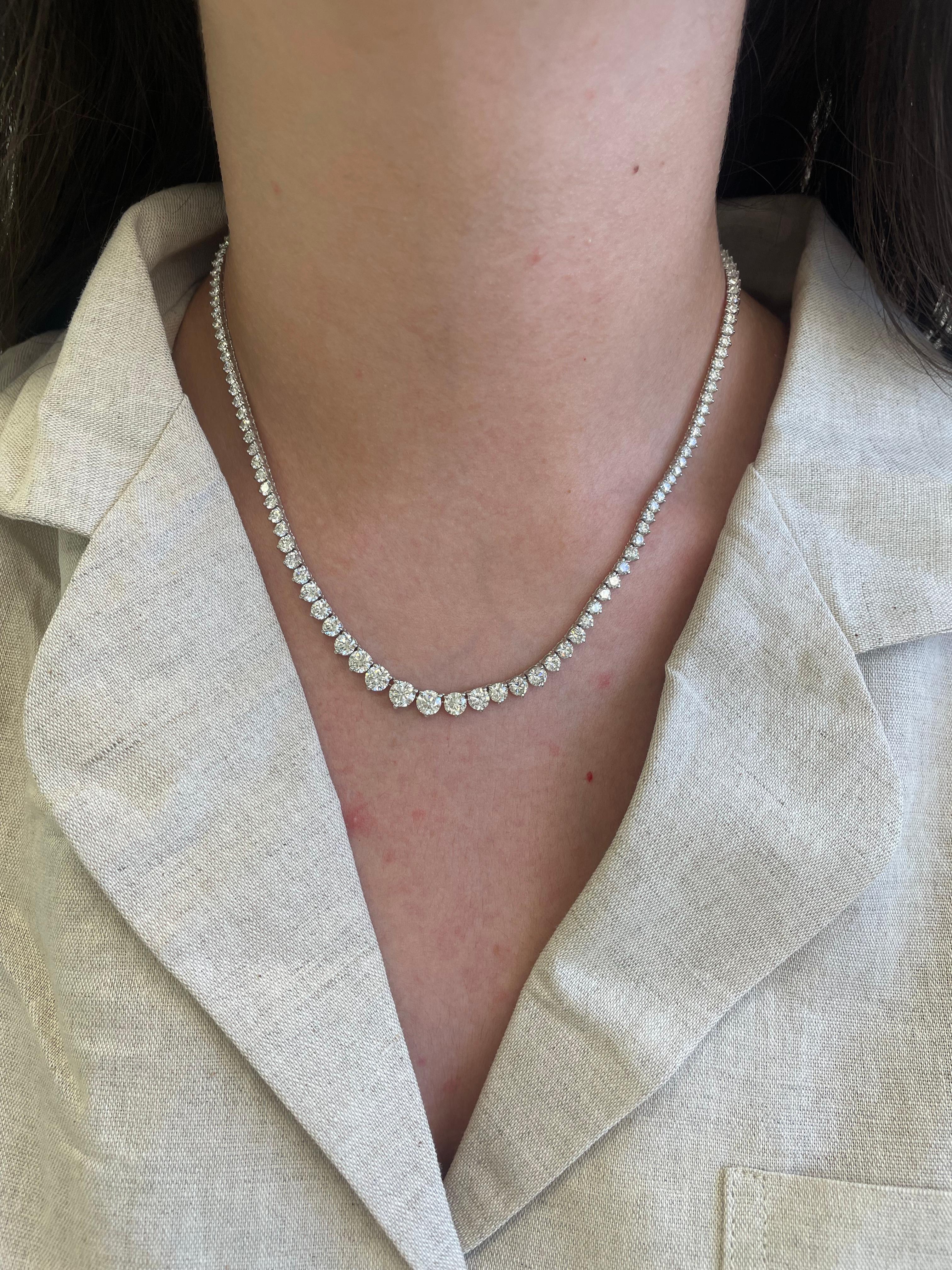 Beautiful and classic diamond tennis riviera necklace, GIA certified, by Alexander Beverly Hills.
133 round brilliant diamonds, 14.52 carats. Approximately H-J color and VVS1-VS2 clarity. Three prong, 18k white gold, 18.42 grams, 16In.
Accommodated