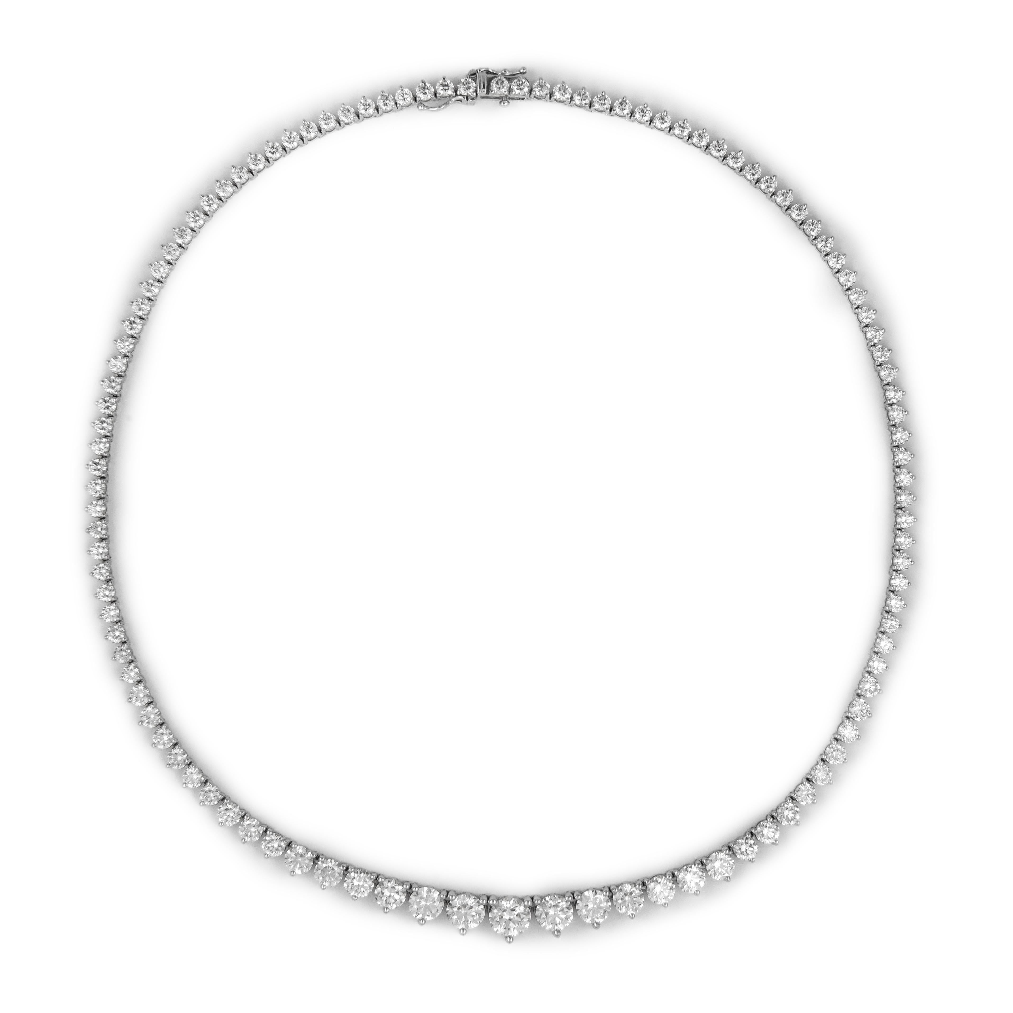 Beautiful and classic diamond tennis riviera necklace with two GIA certificates. High jewelry by Alexander Beverly Hills.
18.58 carats total diamond weight. 
Center 1.02ct round brilliant diamond, I color VS2 clarity, GIA certified. 17.56 carats of
