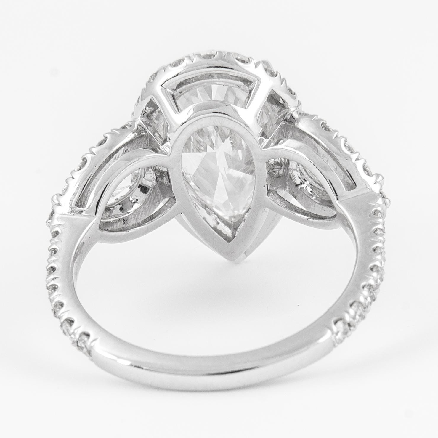 Women's Alexander GIA 4ct Pear Shape Diamond Three Stone Ring 18k White Gold For Sale