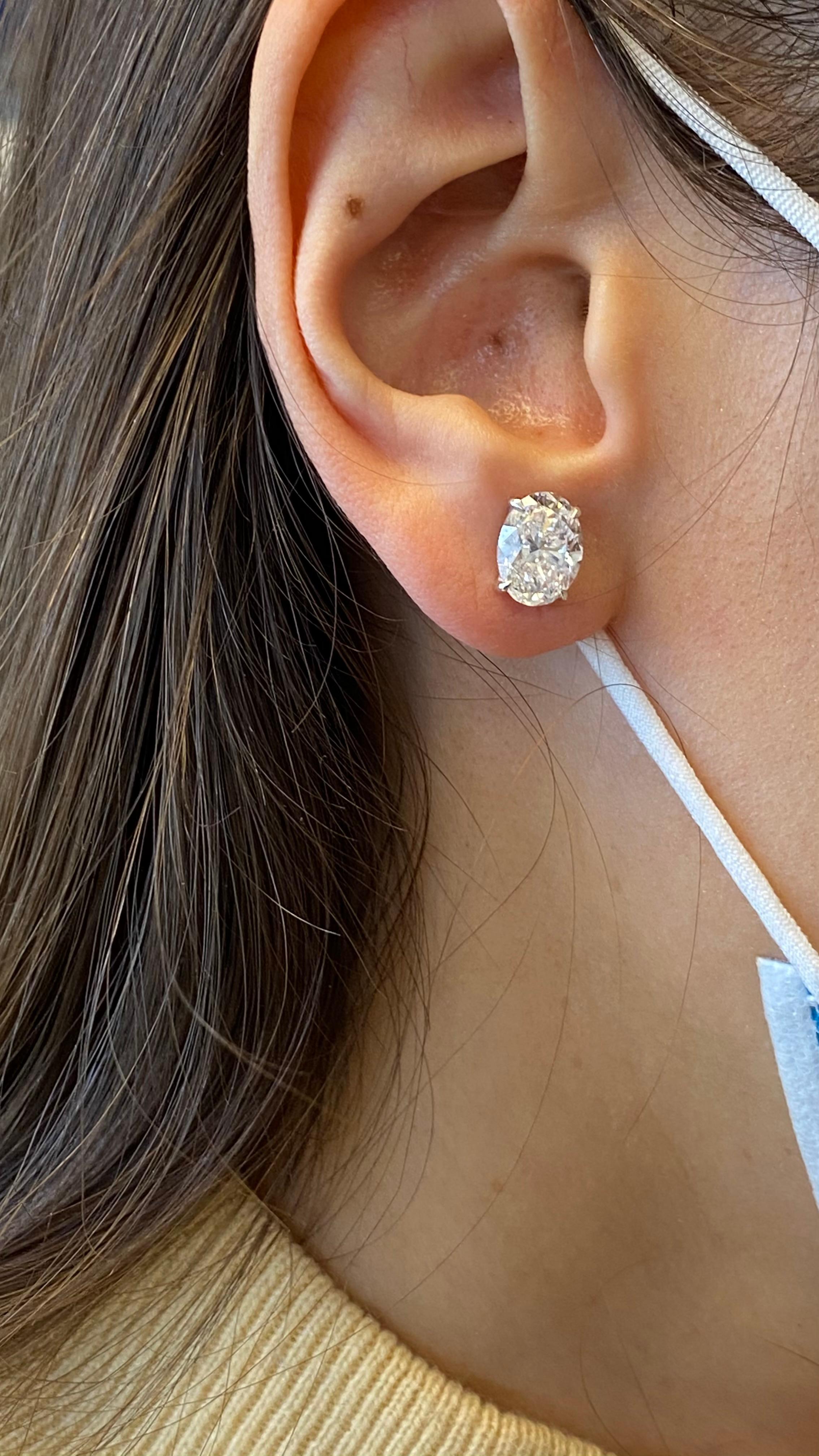 Classic diamond stud earrings, each stone GIA certified. High jewelry by Alexander Beverly Hills.
Two matching oval brilliant diamonds 5.41 carats total. Both D color and SI1 clarity. Four prong set, 18k white gold.
Accommodated with an up-to-date