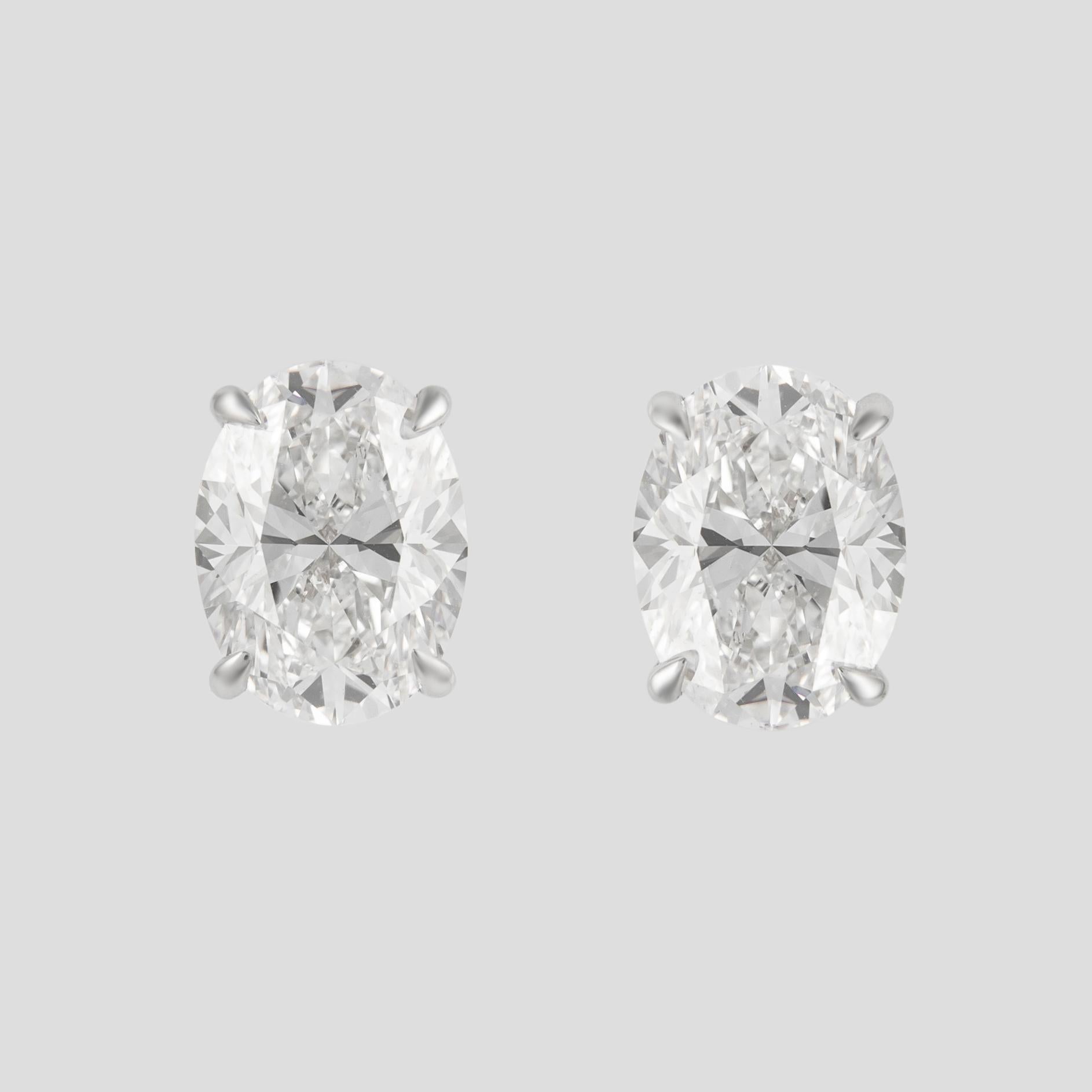 Oval Cut Alexander GIA 5.41 Carat Oval D Color Diamond Stud Earrings 18 Karat White Gold