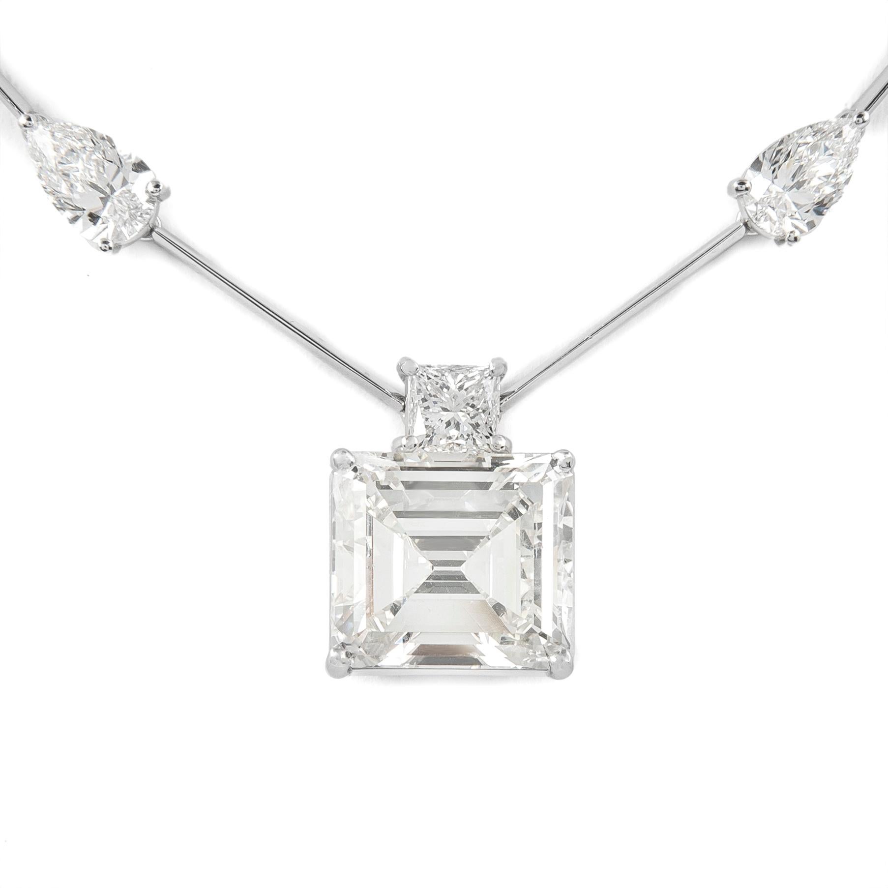 Exquisite and timeless round diamond tennis necklace with attached pear brilliant diamond. High jewelry by Alexander of Beverly Hills.
12.37 carats total diamond weight. 
5.54ct square emerald cut diamond, GIA certified K color and SI1 clarity.
