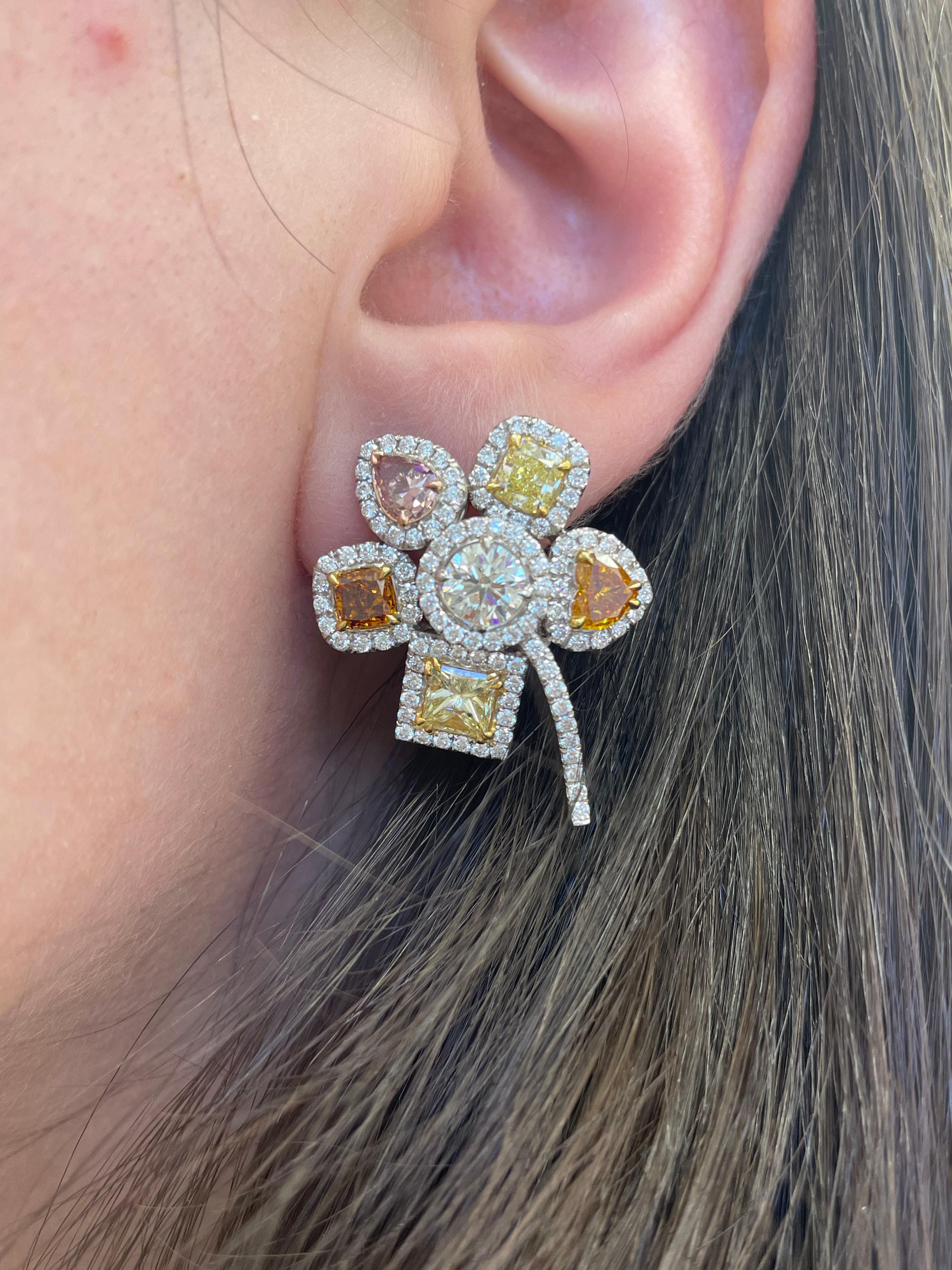 Stunning fancy color diamond floral earrings, GIA certified. High jewelry by Alexander Beverly Hills.
7.52 carats total diamond weight. 
10 fancy color diamonds, 2 GIA certified, 4.56 carats. Ranging from Light to Fancy in Yellows, Oranges, and