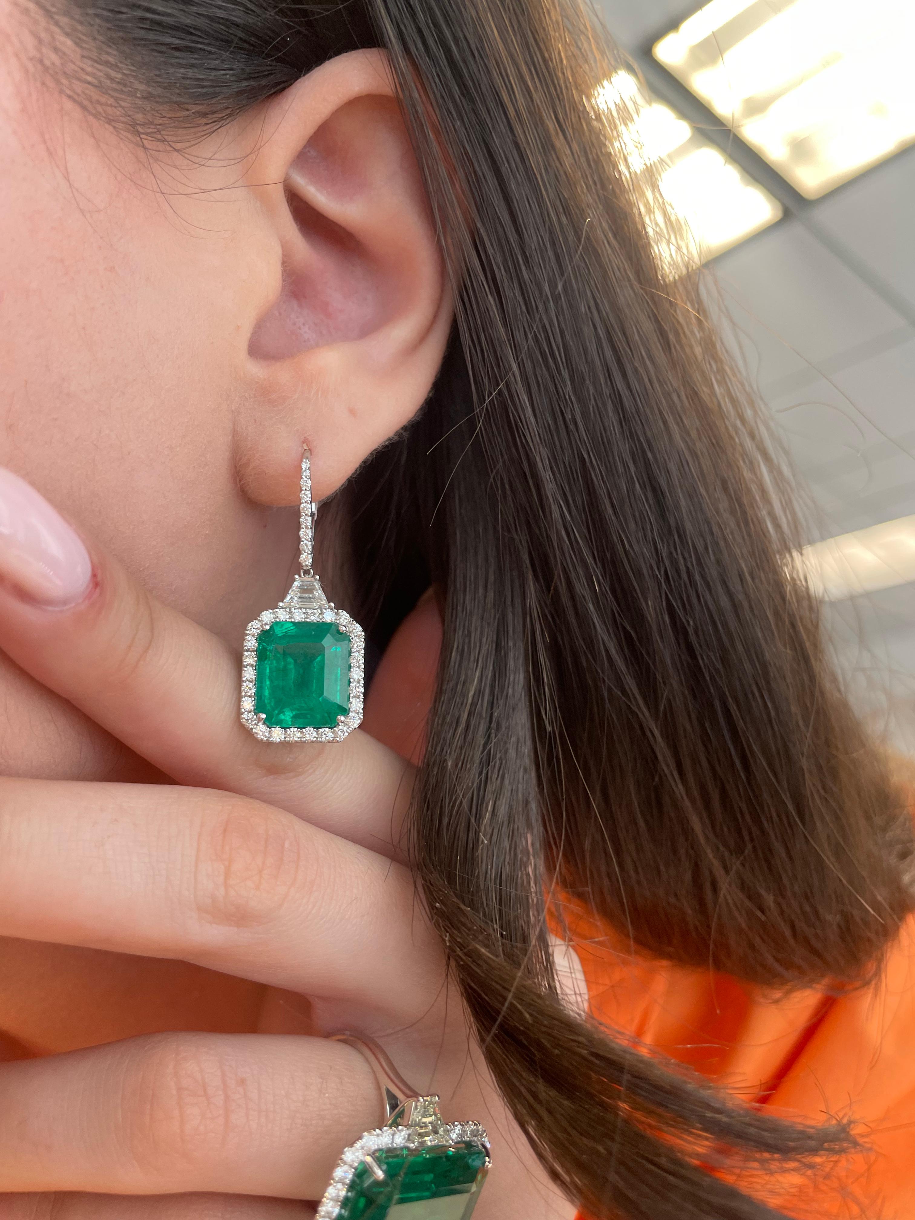 Stunning emeralds and diamond drop earrings, emeralds with superb color and liveliness. GIA & C. Dunaigre certified. High jewelry by Alexander Beverly Hills. 
14.70 carats total gemstone weight.
2 square emerald cut emeralds, 13.08 carats total,