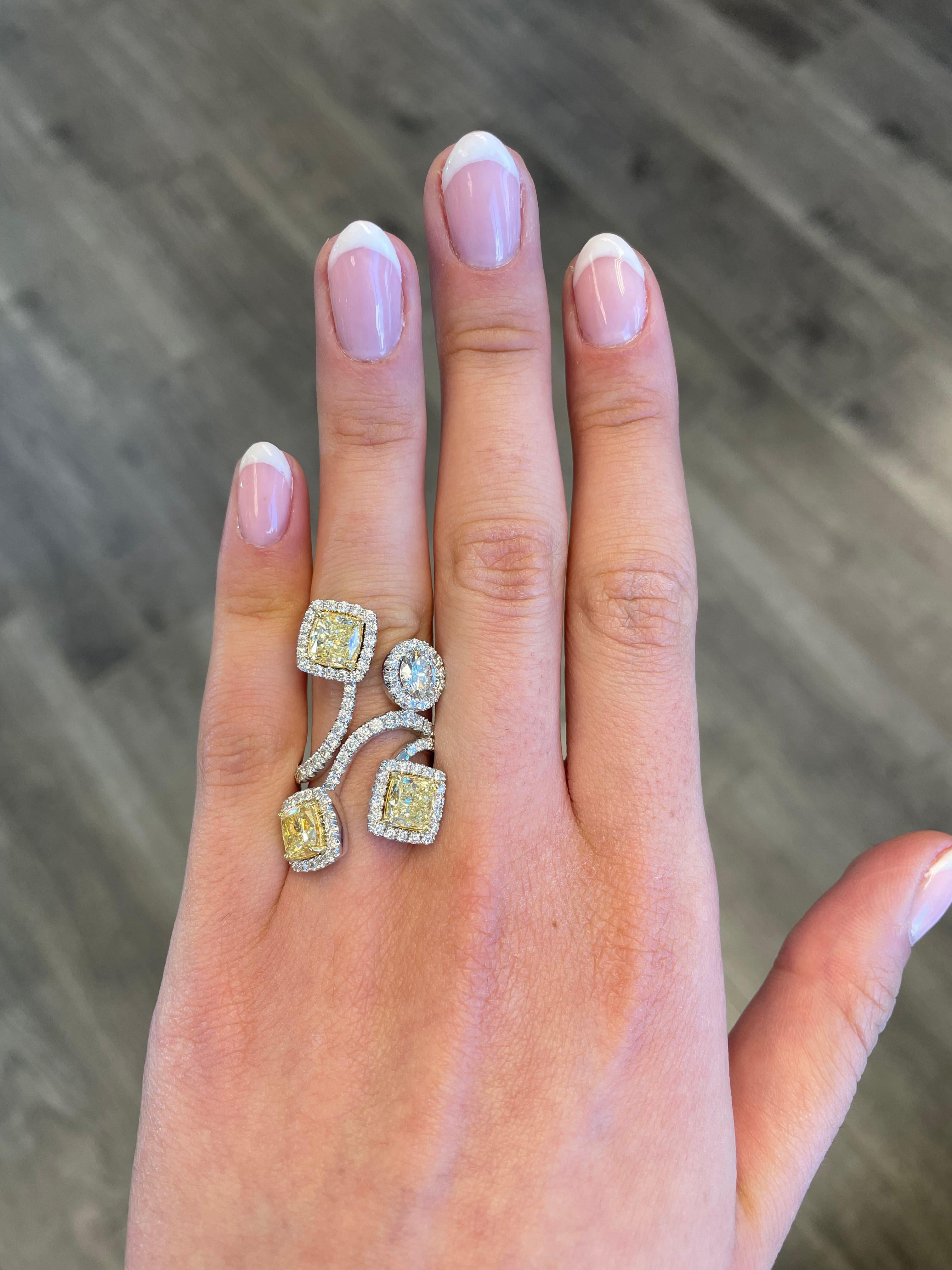 Modern multi yellow YZ diamonds open shank with 3 GIA reports. High jewelry by Alexander Beverly Hills.
7.03 carats total diamond weight.
3 cushion cut diamonds, 4.59 carats total. Both Y/Z color, VS2-SI1 clarity and GIA certified. 1.44 carats of