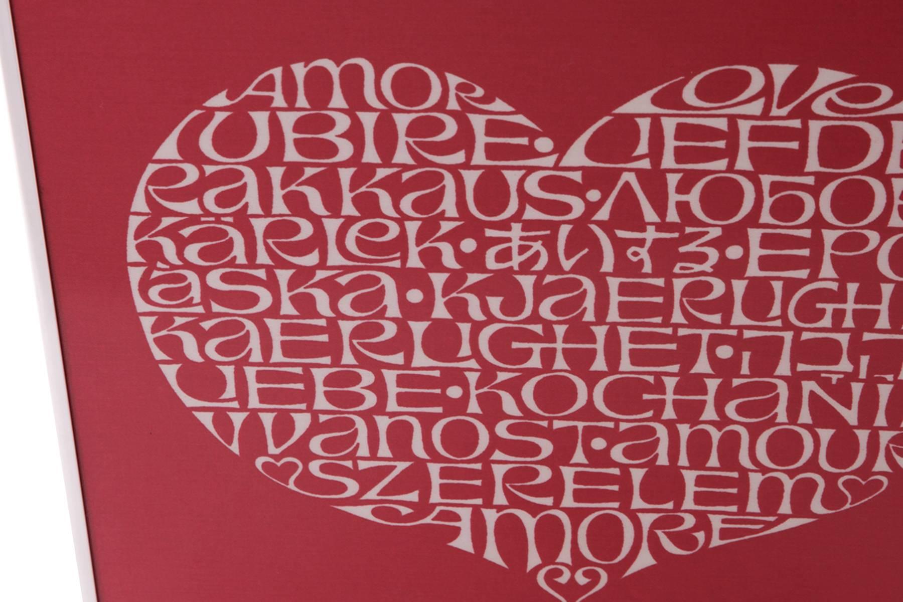 Alexander Girard's International heart features the word Love in 19 languages. It was designed in 1961 for the Textile and objects shop which Alexander Girard created for Herman Miller. This example has a chrome frame.