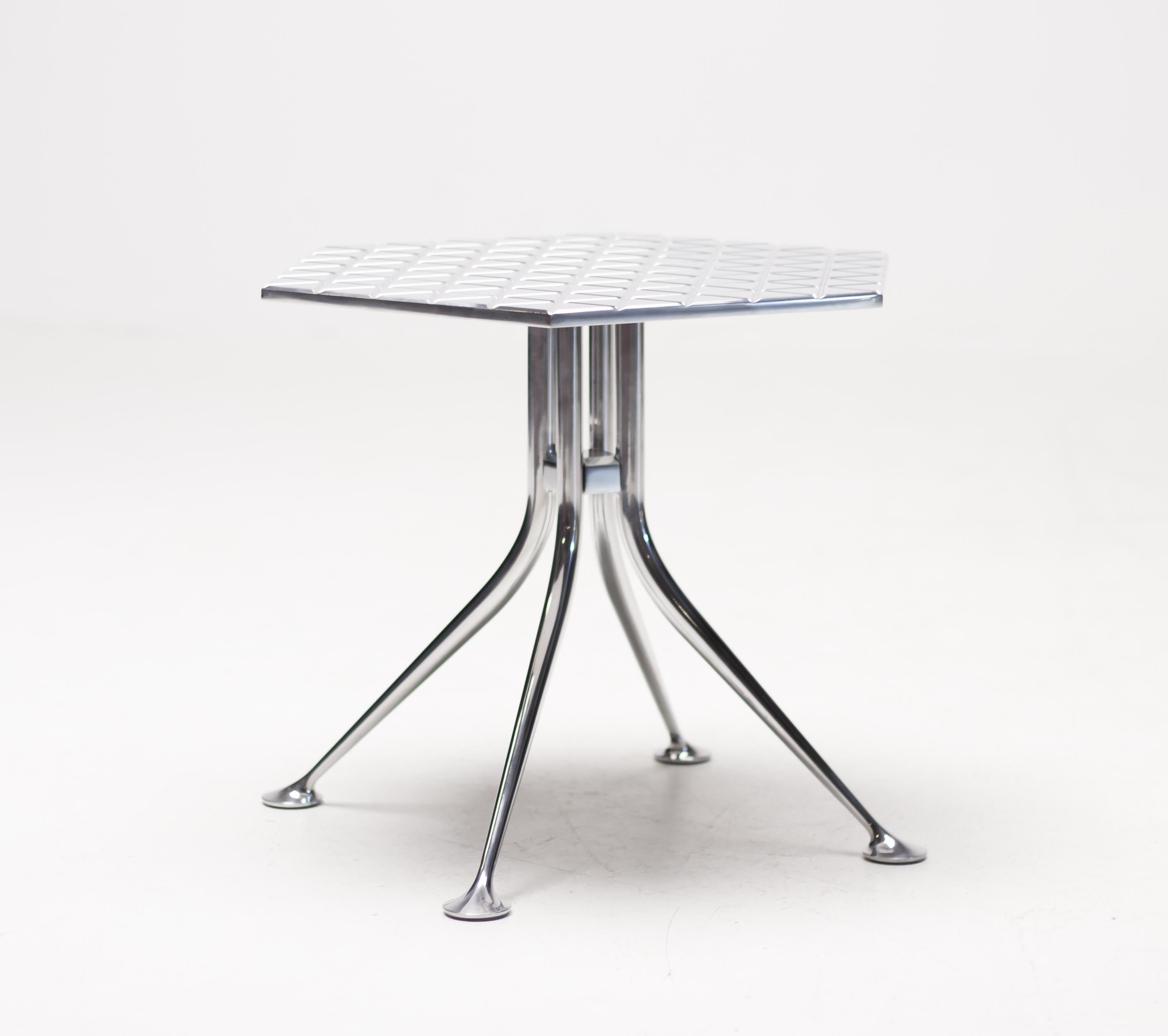 Cast and polished aluminium hexagonal table by Alexander Girard designed for Herman Miller and Braniff Airlines.