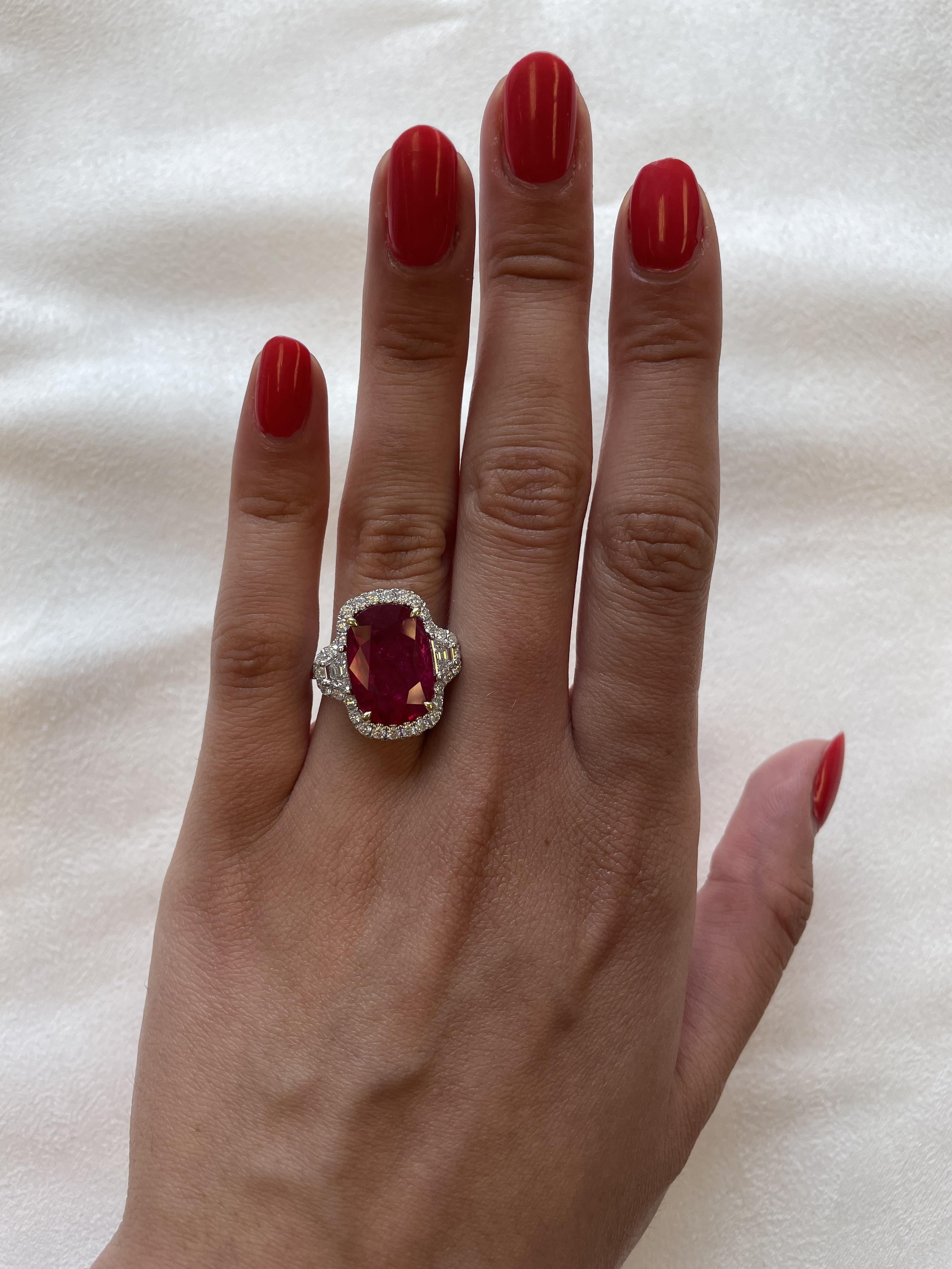 Stunning diamond and diamond three stone ring with halo. High jewelry by Alexander Beverly Hills. 
9.49 carats total gemstone weight.
8.12 carat oval ruby, GRS certified heat. 2 trapezoid with 40 round brilliant diamonds, 1.37 carats. Approximately