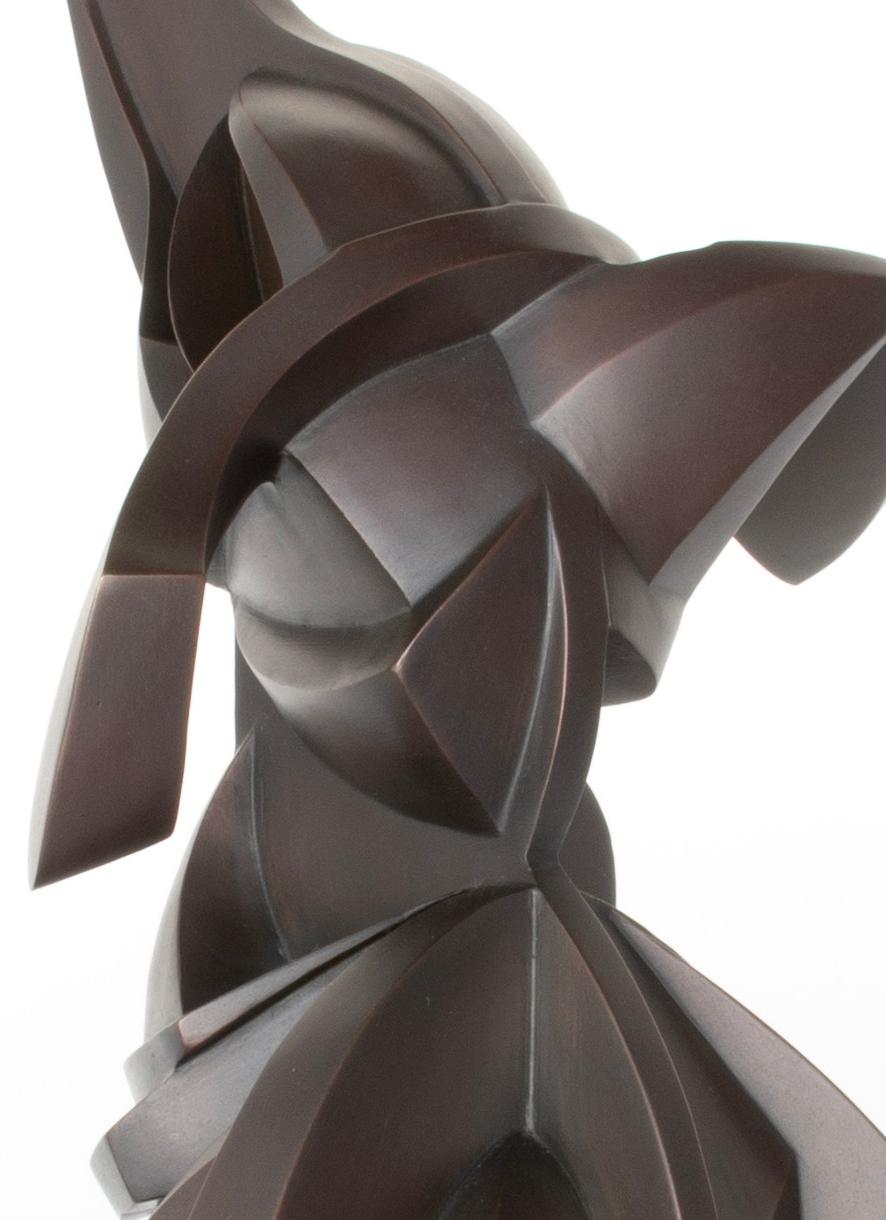 Inspired by Picasso’s cubist era, metal sculptor Alexander Krivosheiw altered his signature fabrication style to create a fragmented, geometric portrayal of a dog called SCOOPS. The bronze canine comes to life as Krivosheiw sculpts the excited