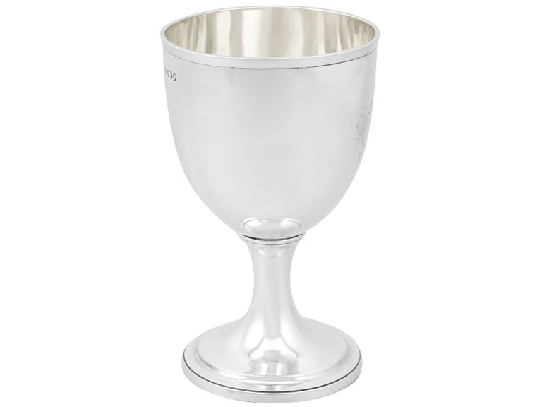 An exceptional, fine and impressive antique Victorian English sterling silver goblet; an addition to our collection of wine and drinks related silverware.

This exceptional antique Victorian sterling silver goblet has a circular bell shaped form