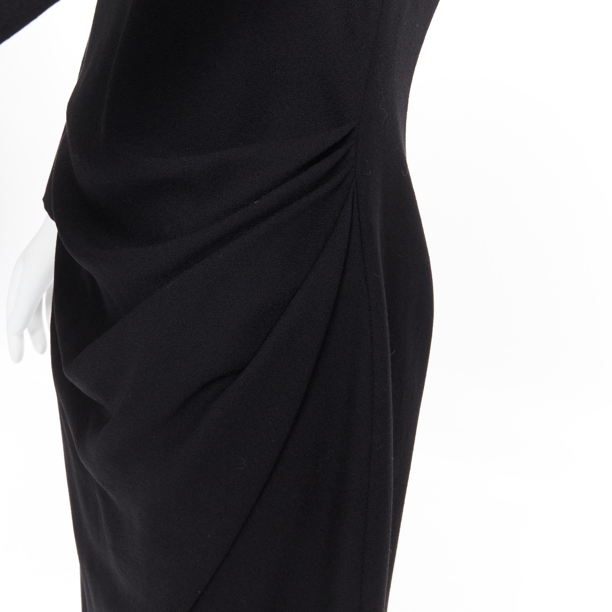 ALEXANDER MCQUEEN 100% wool black cowl neck draped waist knee length dress IT44
Brand: Alexander McQueen
Model Name / Style: Draped dress
Material: Wool
Color: Black
Pattern: Solid
Closure: Zip
Extra Detail: Draped detail at waist. 3/4 sleeve. Cowl
