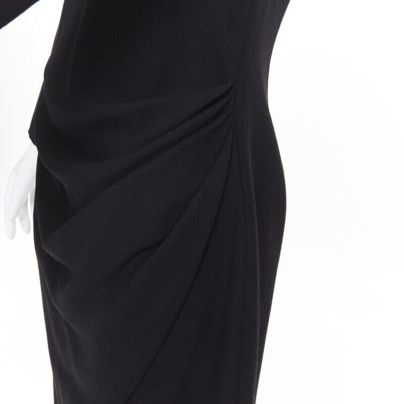 ALEXANDER MCQUEEN 100% wool black cowl neck draped waist knee length dress IT44
Reference: CC/CLWG00328
Brand: Alexander McQueen
Model: Draped dress
Material: Wool
Color: Black
Pattern: Solid
Closure: Zip
Extra Details: Draped detail at waist.
Made