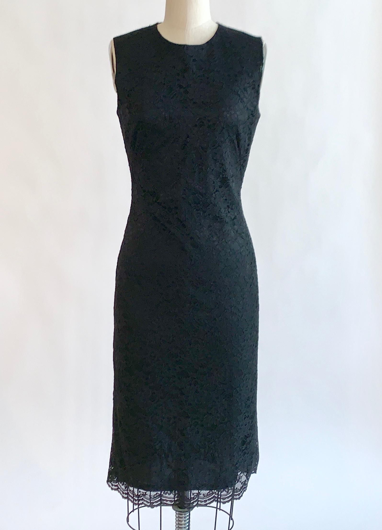 Alexander McQueen black lace sleeveless dress from the designer's Spring 1999 collection. Black calais lace atop a solid black lining. Sleeveless, center back zip. 

70% rayon, 30% nylon.

Made in Italy.

Size IT 42, usually US 6, but seems to best