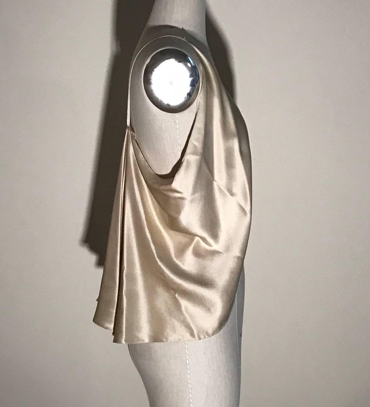 Alexander McQueen 2005/2006 open front cream silk vest. Thin straps with great draping at back. 

100% silk.

Made in Italy.

Size IT 42, US 6, but somewhat flexible due to open front.
Bust 34