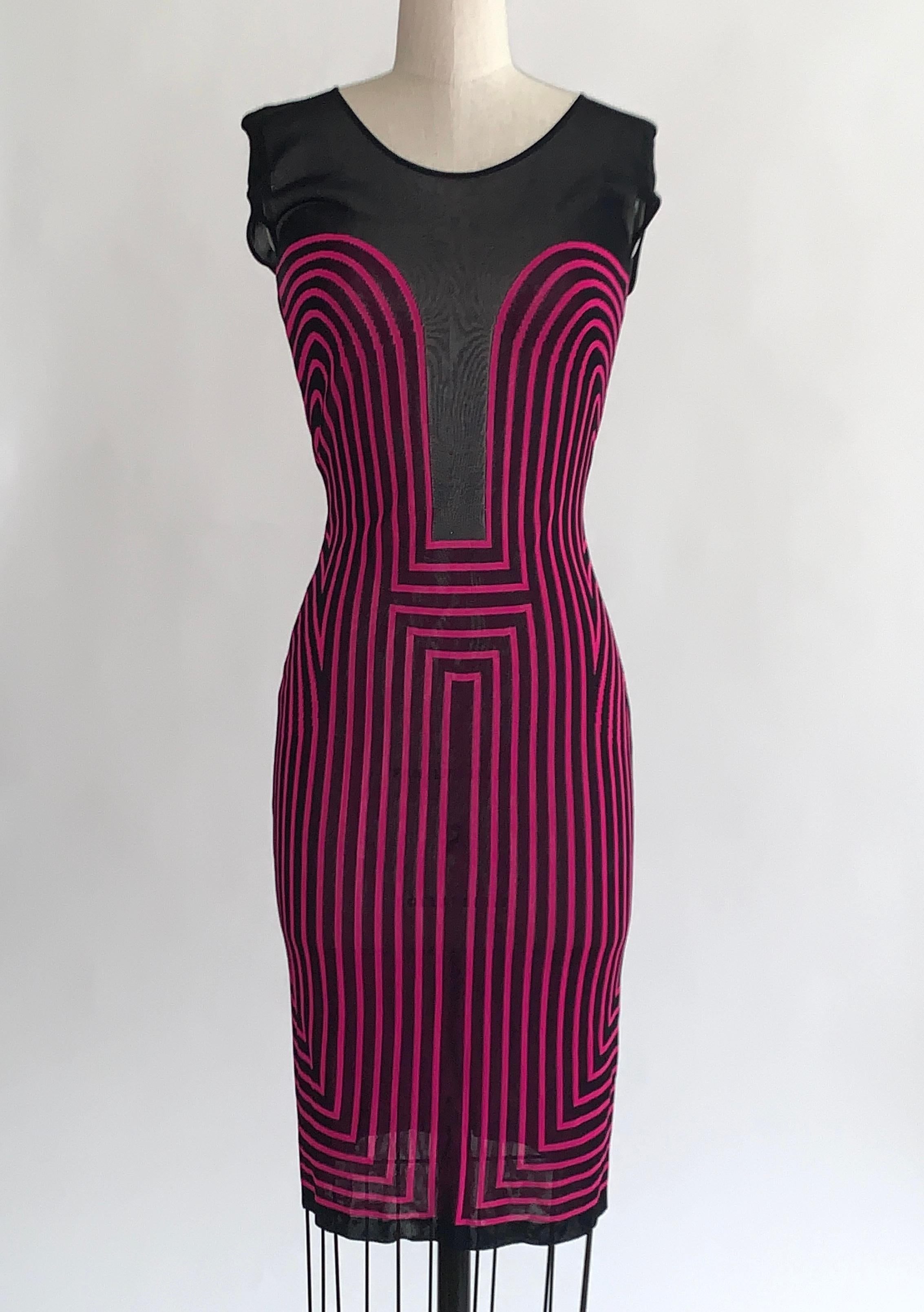 Alexander McQueen pink and black knit bodycon dress with op art style stripes throughout and semi sheer black mesh inset. Pull-on, no closure. 

100% viscose/rayon.

Made in Italy.

Labelled size S. See measurements.
Stretchy, measurements taken