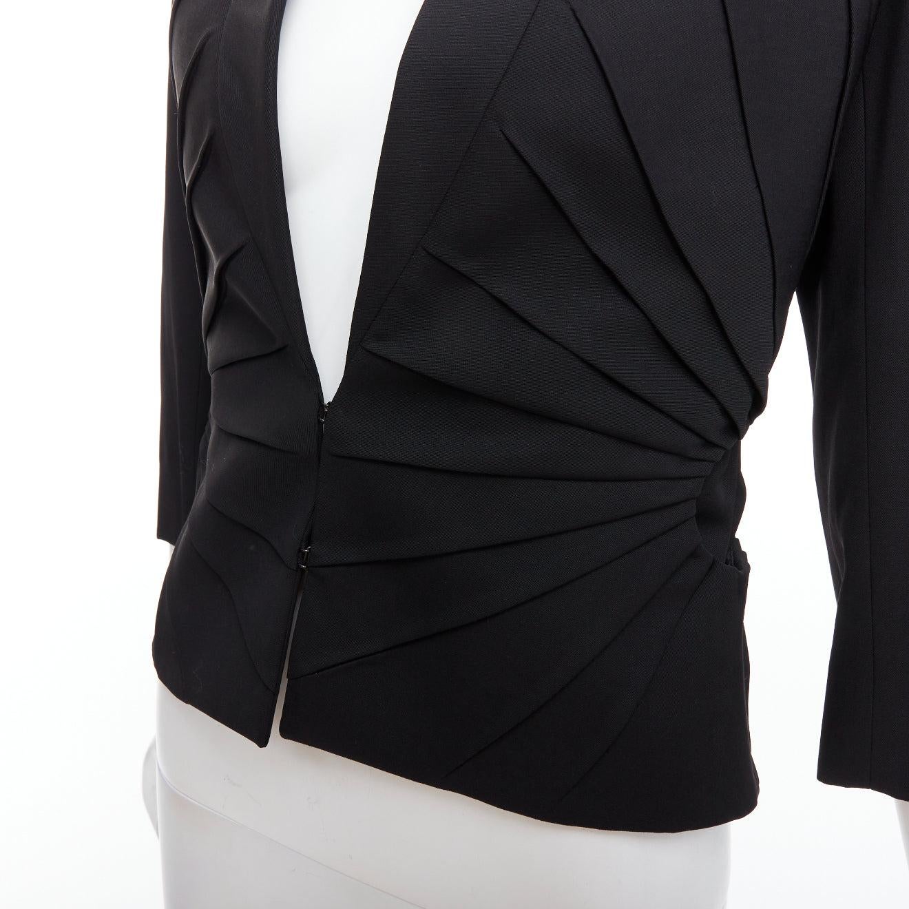 ALEXANDER MCQUEEN 2003 black virgin wool contour pleated dart blazer IT38 XS
Reference: MECG/A00057
Brand: Alexander McQueen
Designer: Lee Alexander McQueen
Collection: 2003
Material: Virgin Wool
Color: Black
Pattern: Solid
Closure: Hook &
