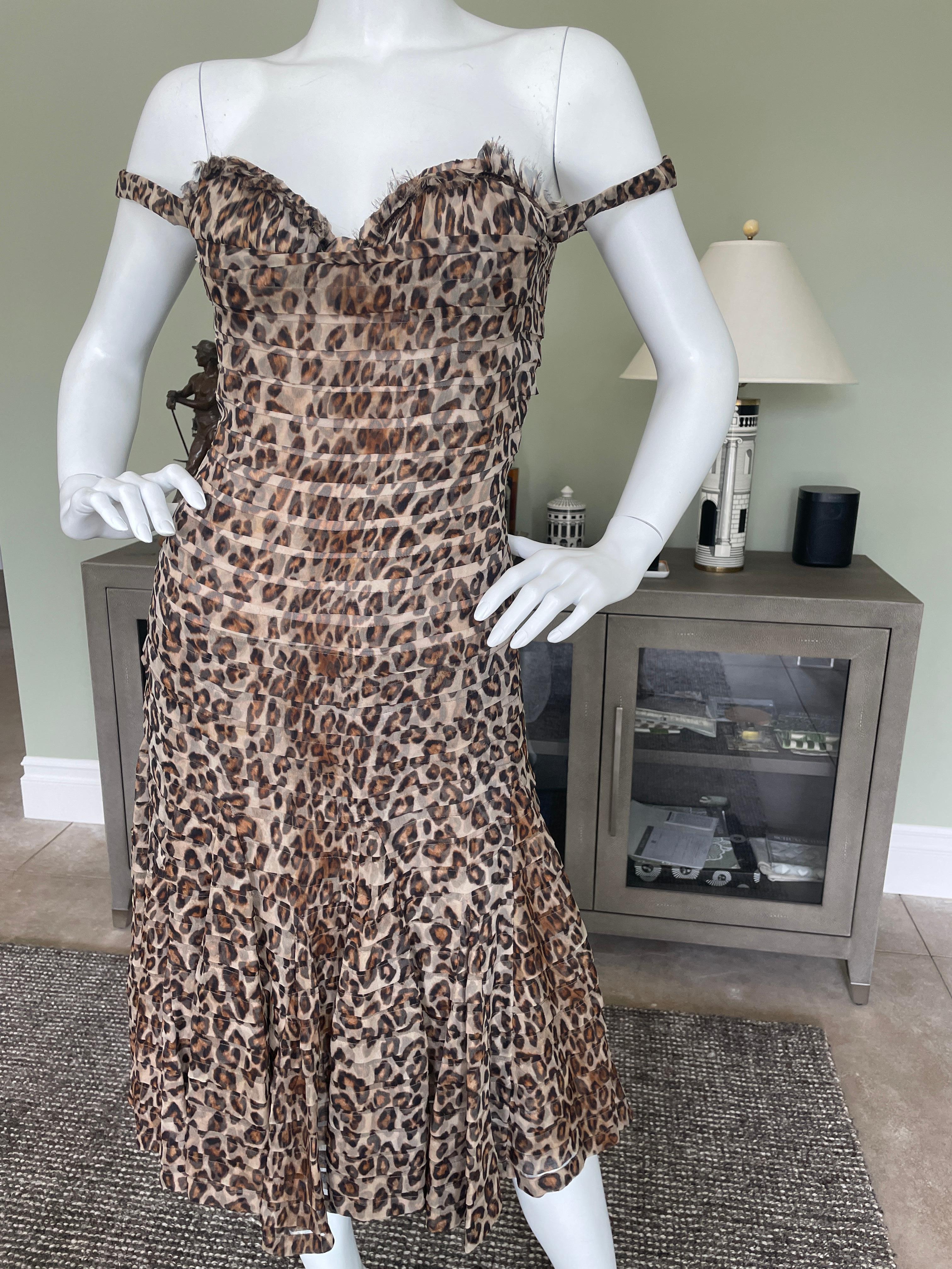 Alexander McQueen 2005 Leopard Print Cocktail Dress with Inner Corset.
This is so pretty, with a full inner corset and off the shoulder straps.
 Size 4-6
 Bust 34