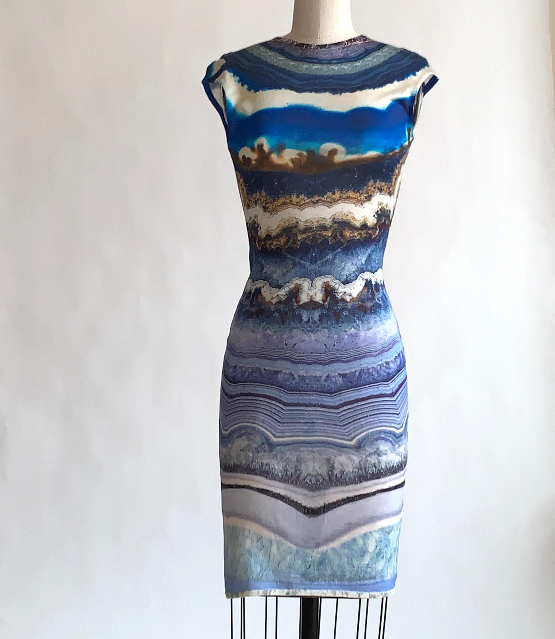 Alexander McQueen blue white and brown dress in an amazing agate crystal print. A fine, lightweight knit with a soft feel (not quite sheer, but if you're shy, you may want to add a slip.) Pull-on, no closure. 

100% viscose (content label missing,