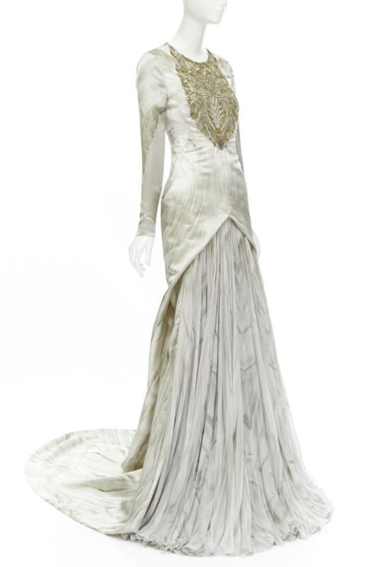 ALEXANDER MCQUEEN 2010 Angels Demons embellished chiffon skirt gown IT40 S
Reference: TGAS/C00389
Brand: Alexander McQueen
Designer: Lee Alexander McQueen
Collection: Fall Winter 2010 Angels and Demons - Runway
Material: Silk
Color: Grey
Pattern: