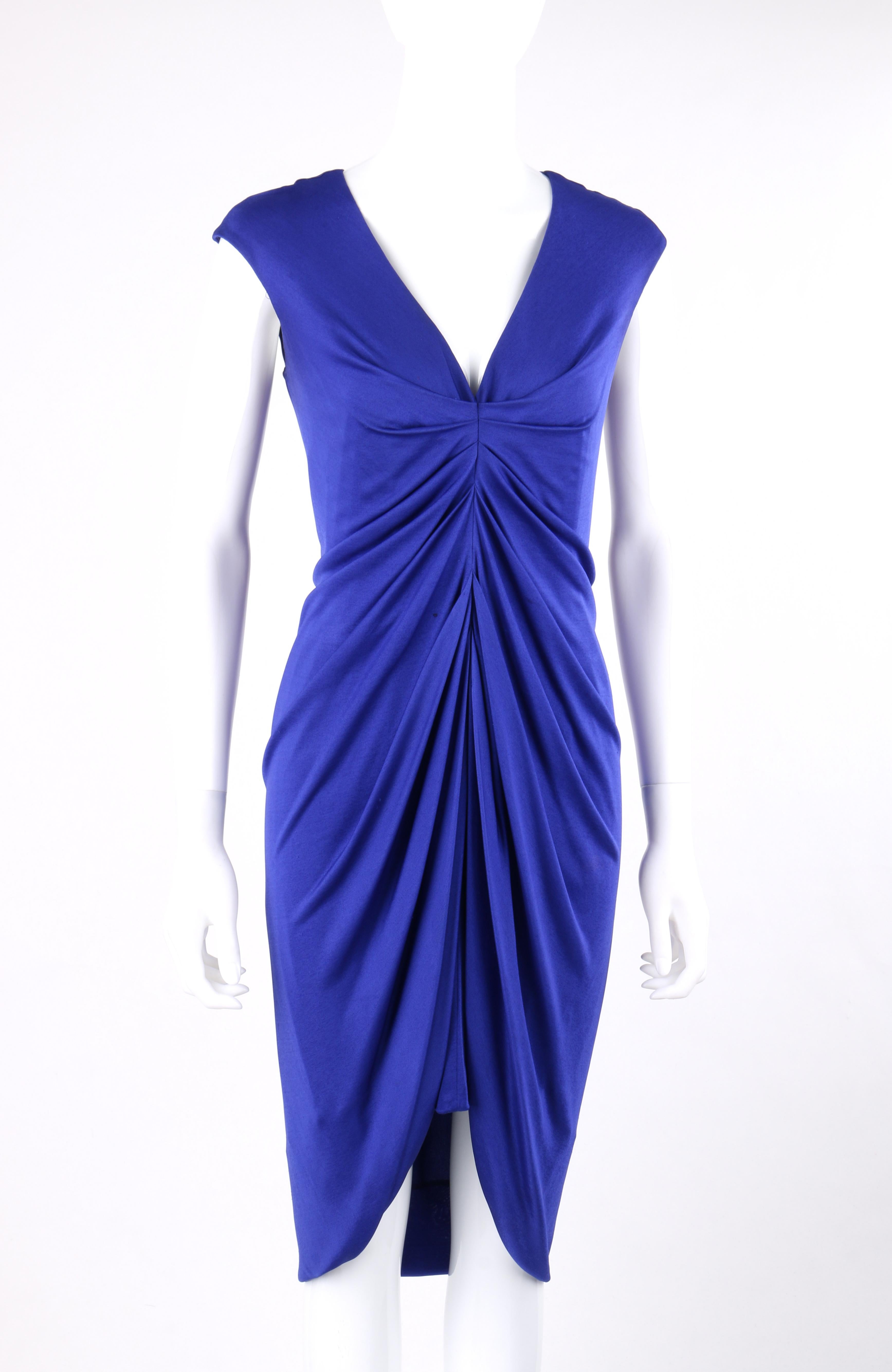 ALEXANDER McQUEEN 2010 Royal Blue Silk High Low Ruched Body-Con Dress
  
Brand / Manufacturer: Alexander McQueen
Style: Ruched body-con dress
Color(s): Sapphire Blue
Lined: Yes     
Marked Fabric Content: Composition: Rayon; 25% Silk. Lining: 75%