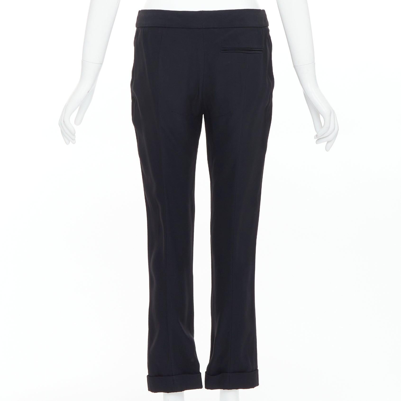 ALEXANDER McQueen 2011 - Pantalon croisé noir taille moyenne et évasé Pour femmes en vente