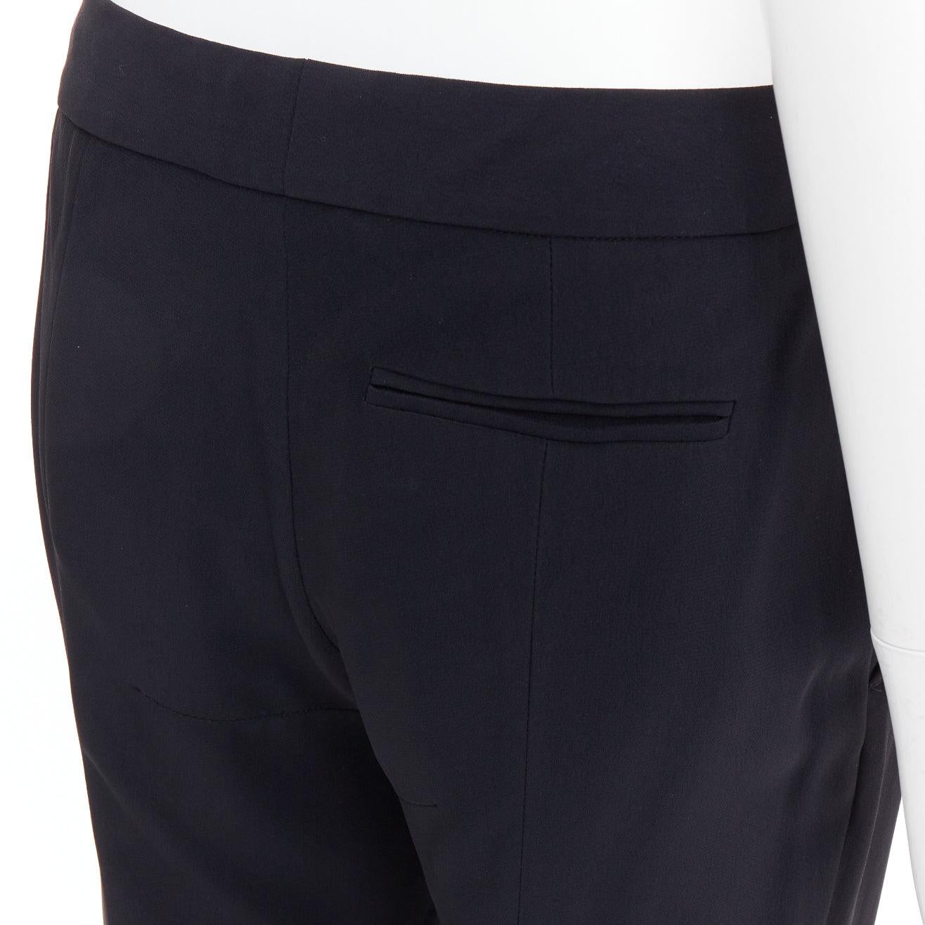 ALEXANDER McQueen 2011 - Pantalon croisé noir taille moyenne et évasé en vente 2